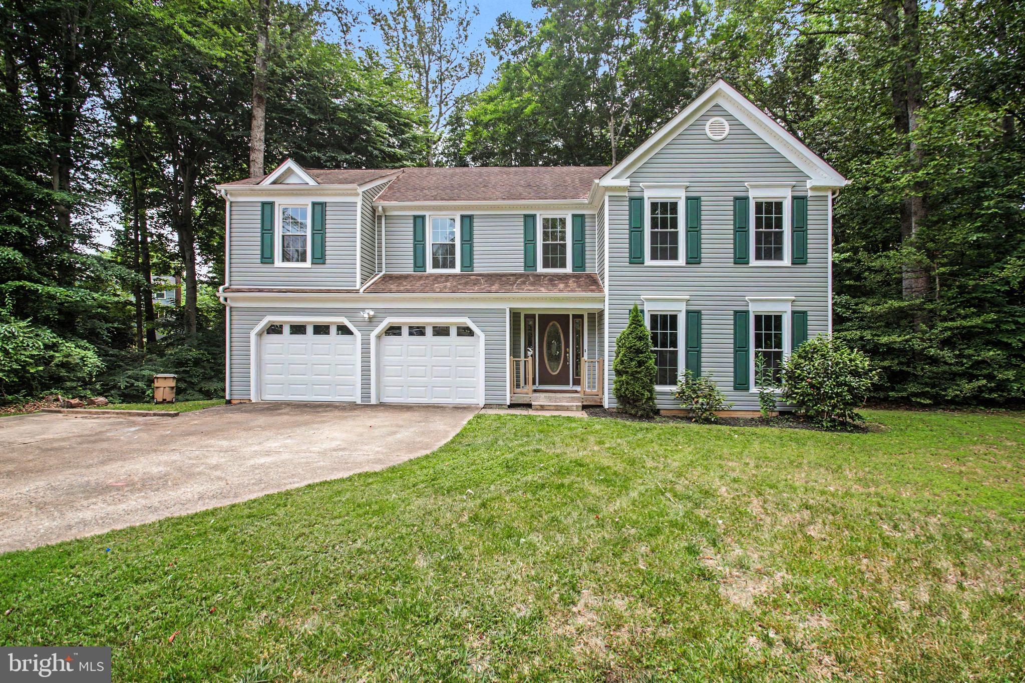 Spacious 4BR, 2.5BA Colonial with Dramatic Two-Story Family Room, Cathedral Ceilings, Family Room Overlook, Cul-de-Sac Location & Mostly Level Lot in Amenity-Filled Aquia Harbour! Highlights & Features Include: Welcoming Foyer with Tile Flooring, Soaring Ceiling, Open Staircase & Family Room Overlook; Spacious Family Room with CATHEDRAL Ceiling, Skylights, Floor-to-Ceiling Painted Brick Wood-Burning Fireplace, Ceiling Fan & Sliding Glass Door to Rear Deck; Formal Dining Room with Shadow Box Molding & Chandelier; The Kitchen Features Granite Countertops, Abundant Cabinetry, Stainless Steel Appliance Package & Distinctive Octagonal Ceiling Detail; Pantry/Laundry with Shelving & Conveying Washer & Dryer. The Open Layout Creates Excellent Flow Between Living, Dining & Entertaining Spaces. Upstairs, Engineered Hardwood Flooring Extends Throughout the Bedroom Level. The Primary Suite Features a CATHEDRAL Ceiling, Walk-In Closet & Additional Closet; Private Bath with Dual Sink Vanity with Storage, Soaking Tub & Recently Updated Step-In Shower with Ceramic Tile Surround. Bedroom 2 Includes a Double Closet, Bedroom 3 with Ceiling fan with Light, Skylights & Double Door Closet. Bedroom 4 & Hall Bath Complete the Upper Level. The Open Hallway Overlooking the Family Room Below Adds Architectural Character & Enhances the Home's Bright, Airy Feel. Outdoor Features Include an Architectural Shingle Roof; WIDE Concrete LEVEL Driveway; Two-Car Garage; Quiet Cul-de-Sac Location; Mostly Level Lot Surrounded by Mature Trees; Rear Deck Accessed Through Triple-Panel Glass Doors and Offering Two Staircases to Grade, Creating Easy Access to the Backyard and Additional Space for Outdoor Entertaining, Relaxing, or Everyday Enjoyment. HVAC (2020) Siding, Windows and Roof Less than 10 years old.  The Abundant Aquia Harbour Amenities include 24 Hour Manned Front Gate + Residents Only Rear Gate; Two Pools; State Certified Police Force; Fire Dept; Marina w/Boat Ramp & Fishing Pier; Kayak/Canoe Launches; Golf Course w/Pro Shop, Putting Green, Driving Range & the World Famous Clubhouse @ Aquia Harbour Restaurant; Dog Park; Horse Stables, Riding Areas/Trails & Pens; Secure Storage Lot; Community Garden; PreSchool; Fishing Park; 8 Other Parks w/Tot Lots, Tennis & Basketball; Nature Park Like Surroundings with Tons of Wildlife including Deer, Fox & Bald Eagles Above! Don't Forget About the Community Events, including the Independence Day Celebration w/Parade and Fireworks, Oktoberfest, Outdoor Movies, and More!***Any Offer Submissions Need to be Received by Monday Night 6/22 for Review and Response on Tuesday 6/23***