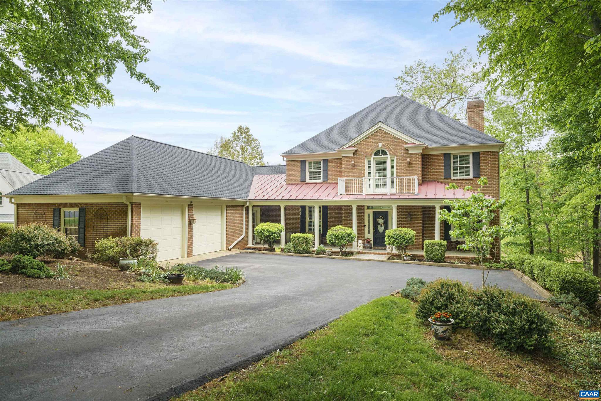 Extraordinary Glenmore waterfront residence with sweeping pond, fountain, and 7th tee views, ideally located on a private cul-de-sac. Enjoy resort-style living with golf, clubhouse, dining, pools, tennis, fitness center, and walking trails. This all-brick Georgian home offers over 5,000 finished sq. ft. and nearly $200,000 in recent upgrades, including roof, decks, HVAC, whole-house generator, window coverings, lighting, water heater, toilets, and gutter screens. Designed for main-level living, it features two primary suites, including one on the first floor, plus three additional bedrooms and 3.5 baths.   Highlights include a gourmet granite kitchen, loft/study with panoramic views, finished walkout terrace level, two wood-burning masonry fireplaces, Low-E vinyl-clad windows, 2x6 construction, maple flooring, and custom glass-front maple cabinetry.   Outdoor spaces include gracious columned front and rear porches, charming courtyard entrance, and three decks?one covered and one screened?perfectly positioned to capture stunning water, golf, and landscaped views. A rare Glenmore offering that shows like a model home.,Glass Front Cabinets,Granite Counter,Wood Cabinets,Fireplace in Basement,Fireplace in Living Room