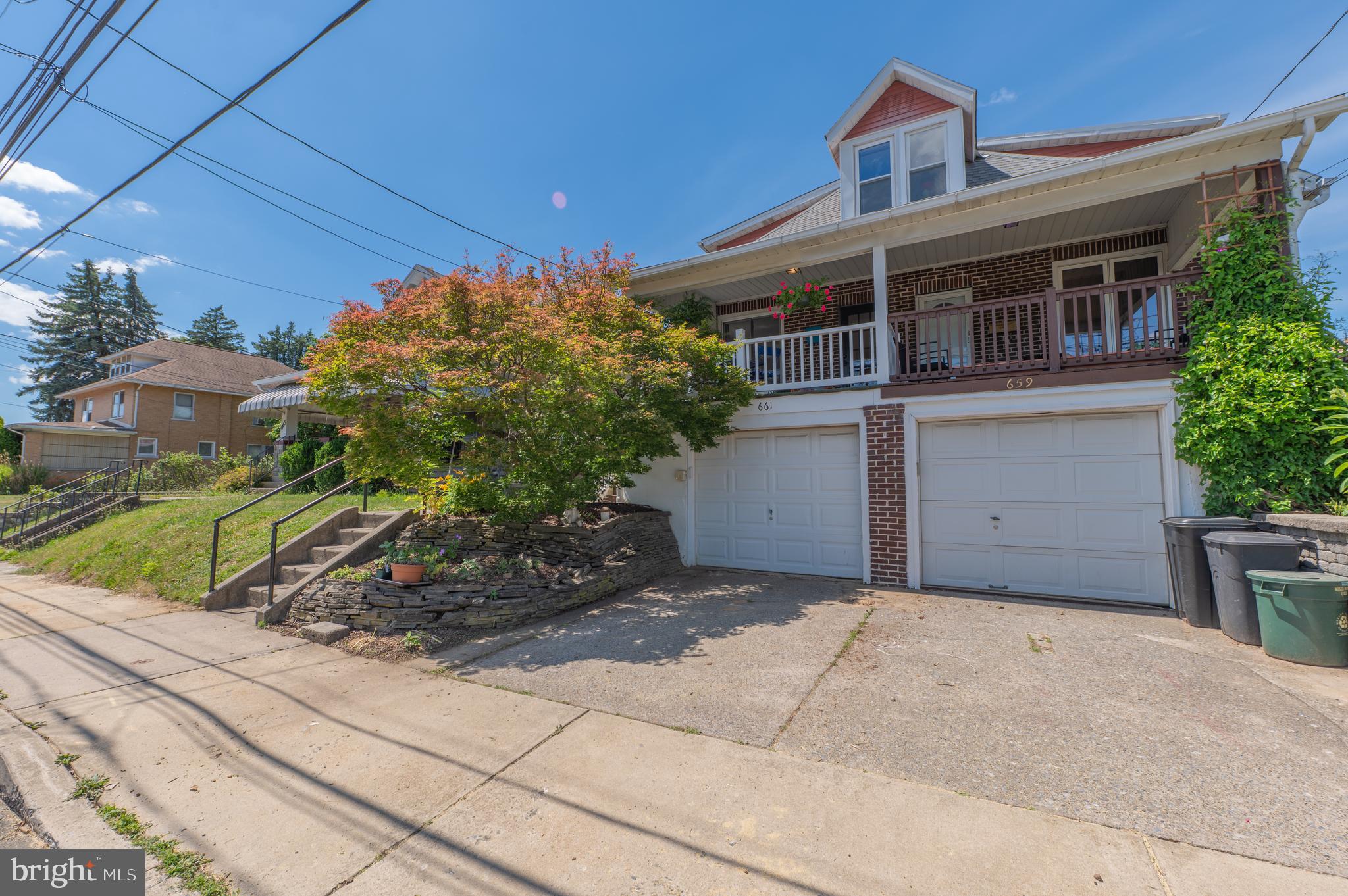 Find the perfect blend of small-town charm and modern convenience in this well-maintained and updated 3-bedroom, 2.5-bath twin home. Located in the vibrant heart of Emmaus, this warm and inviting home offers an unbeatable walkable lifestyle. Head up the stairs to the spacious covered front porch and into a large bright living room which leads to a sunny dining room where the gleaming hardwood continues. The kitchen, which contains stainless appliances, maple cabinets and a handmade Italian tile backsplash, opens directly onto the expansive deck and backyard—a convenient setup for grilling, entertaining or unwinding. There’s also an updated half-bath on the first level. Upstairs are two nicely sized bedrooms and a full bath. Another full bath and bedroom are on the lower level, offering a fabulous guest space. A one-car garage, driveway, and parking pad in back provide plenty of space for vehicles. The rear yard is a gardener’s paradise with an abundance of raised beds and fruit trees/bushes including peaches, blackberries, raspberries, currants, sour and sweet cherries! Enjoy this lovely home in a quiet East Penn neighborhood close to restaurants, shops, schools, and easy access to commuter routes. Schedule your showing today!