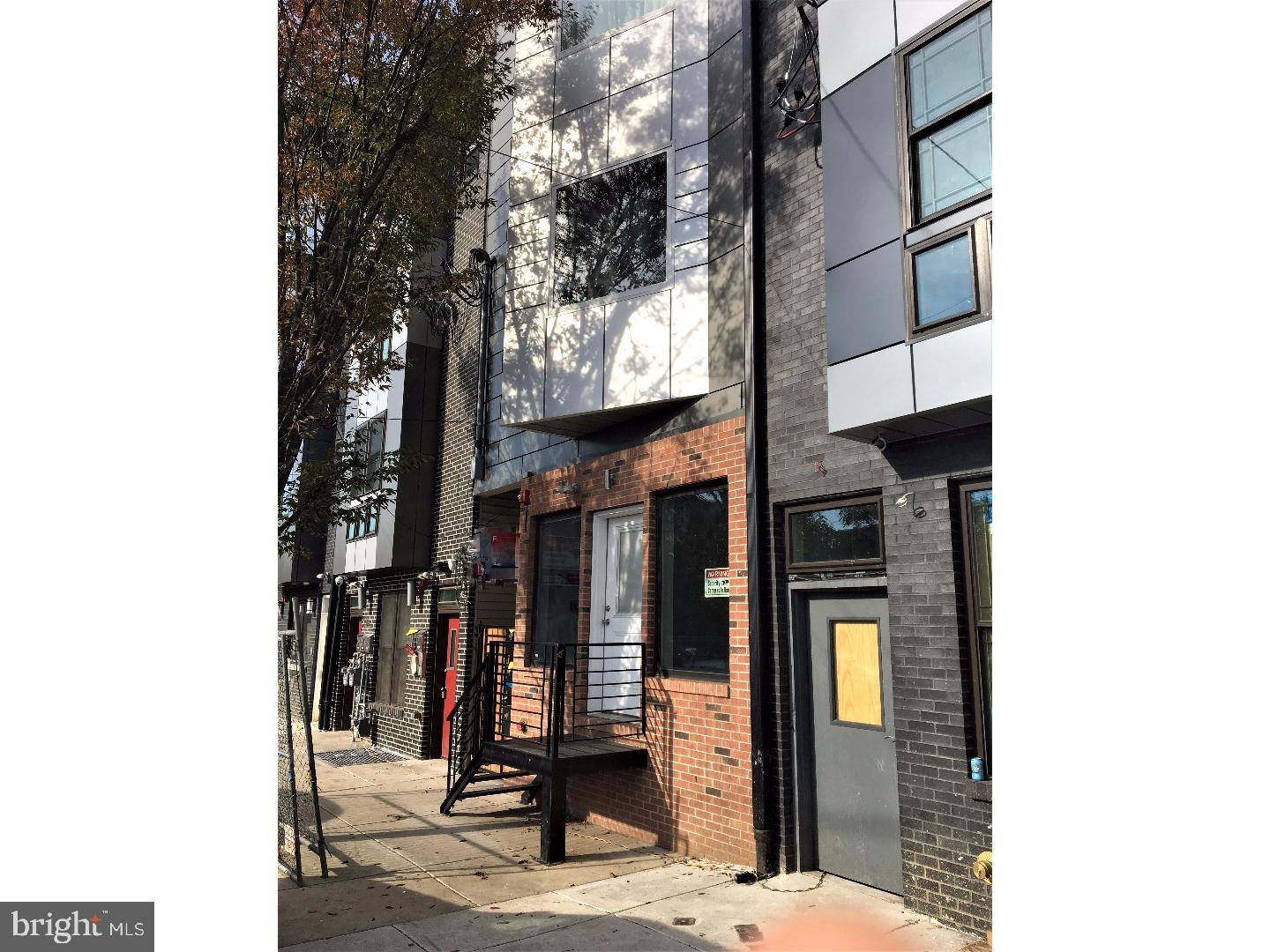 New Construction, First floor, Commercial, Store Front for RENT on the busy Frankford Ave corridor with TWO MONTHS FREE RENT for 3 year lease only. With a beautiful facade of brick and panel, plus the huge store front windows, this modern shop is sure to allure customers passing by. The unit is bi-level with 1100 square footage on the main floor, which is tiled and has access to a full unfinished basement. There is 1 bath, recessed lights, access to a rear patio, central air, and sprinkler system. Above are two residential units being rented separately. We welcome your visit to 2568 Frankford Ave!