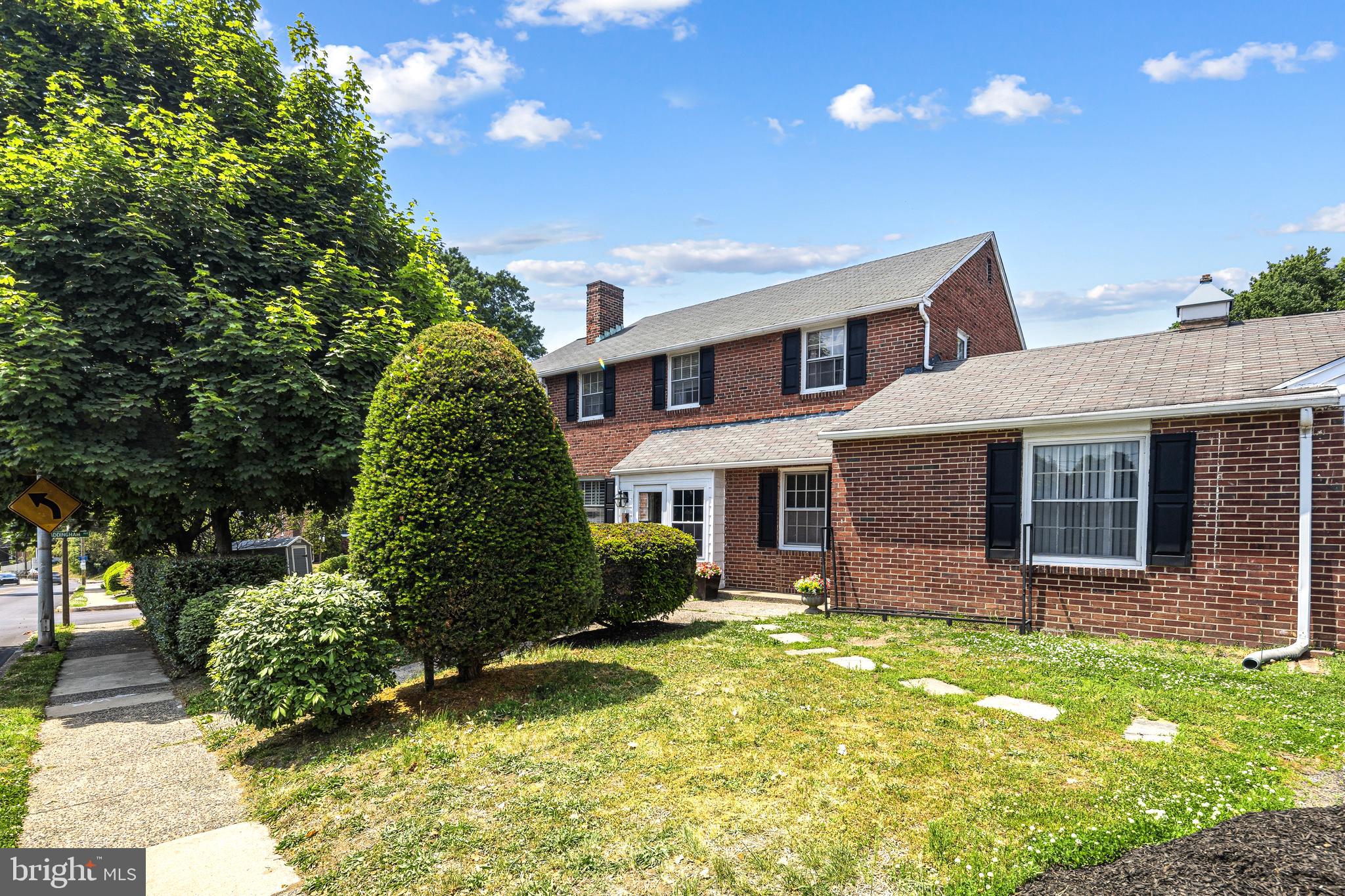 Welcome home to this expansive 4-bedroom 3 full bath colonial style home with a separate entrance In-Law Suite in Drexel Hill! This home is located at the corner of Addingham Ave and State Rd (the property address is also known as 4713 State Rd entrance is on State rd).  This spacious home features crown moldings, chair rail, brick, wood burning fireplace, recessed lighting and hardwood floors throughout. The main level offers living room, formal dining room, oversized sun porch that may be used for extra living space such as an office/playroom etc. and eat-in-kitchen. The Kitchen has plenty of storage space and countertops making it a breeze to prepare meals for the entire family!  The kitchen provides access to the backyard and basement. The second floor has a primary bedroom with walk in closet, primary bath with double sinks, separate shower and bathtub and tile flooring.  The second floor has an additional three bedrooms, two full baths and upstairs laundry! The In-Law Suite has it`s very own private entrance, 1.5 Baths, and full Kitchen.  This space can be great for extended family or income potential! The basement is partially finished for additional space, separate mechanical areas, opportunity for second laundry room and access to outside. Other amenities include two car attached garage with inside access. Conveniently located to schools, playground, shopping, transportation and major roads. This home is wonderful for entertaining family and friends. Home is being sold in as-is condition. Live where you love and call this place home!