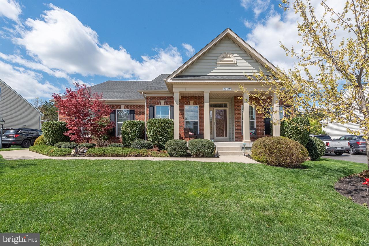Welcome to your forever home! With over 5,000 square feet of living space and an attached two-car garage, this 3 level property offers the perfect blend of style, functionality, and comfort. The stunning open plan provide endless possibilities to make it uniquely yours. Arched openings, vaulted ceilings, wide plank engineered hardwood floors lend a modern and sophisticated feel throughout and comes with a tastefully designed landscaping around the home.
The main level features three spacious bedrooms. The owner’s suite is a private retreat with walk-in closet, a luxurious shower with a bench, dual sinks on a comfort-height vanity. Two additional bedrooms with Elfa closets and an upgraded hall bathroom are conveniently located in the center of the home, a mudroom and laundry area thoughtfully designed to maximize space. The kitchen is a delight for any cook, offering a high-end ceramic sink with ample counter and cabinet space, a custom marble backsplash, and upgraded granite countertops with a breakfast bar. The dinette and Living room are seamlessly connected to the kitchen, making them ideal spaces for entertaining or relaxing. Just off the large living room, a 600-square-foot deck with double awnings and level backyard extend your living space outdoors, perfect for gatherings and activities. This home is packed with modern conveniences, including overhead lighting in every room, whole house water filtering and softener system, tinted windows, 8 zone sprinkler system and desert natural ledgestone TV wall.
The upper level consists of a large spacious bedroom with two closets, a full bath and a study/office room.
The recently finished basement adds over 2,300 additional square feet of living space, offering luxury vinyl plank flooring, recessed lighting throughout. This level also includes a large room with a walk-in closet and a full bathroom, a movie room with QuietRock ceiling panels and premium carpet for soundproofing. Movie theatre is pre-wired for a 11.2.2 system for real movie experience, and basement has several storage closets to keep your life organized. 
Not only is the home fabulous, so is the community with a private lake where you can fish and canoe, a sandy beach, walking trails, a picnic area with grills, and a 2-acre dog park, residents are offered a pool membership each summer at a neighboring community. Don’t let the ranch style fool you—this home offers an incredible amount of space, comfort, and convenience. Just minutes from major commuting routes, shopping, dining, and neighborhood schools, it’s the perfect place to call home.