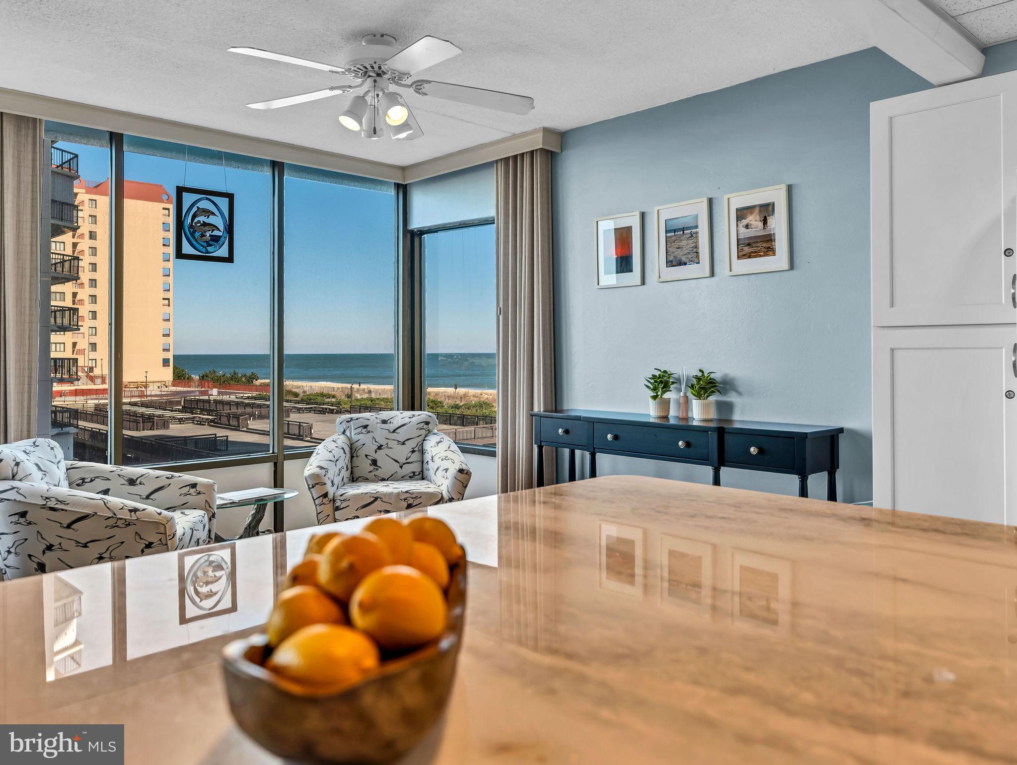 Welcome to Capri 308, where breathtaking ocean views, luxurious upgrades, and resort-style amenities come together to create the ultimate coastal retreat. This stunning 2-bedroom, 2-bathroom condo is designed for effortless beach living, offering a bright and airy open floor plan that seamlessly blends comfort and style. From the spacious living room, enjoy incredible views, where the sparkling waves provide a serene backdrop right from your couch, which is a sleeper sofa! The beautifully upgraded kitchen is a standout feature, showcasing exquisite two-toned cabinetry, sleek countertops, and a coastal-inspired design that perfectly complements the beachfront setting. With a generous dining area and a breakfast bar, there’s plenty of space to entertain guests and savor meals with an ocean breeze just steps away. The large private balcony is your front-row seat to spectacular sunrises and moonlit waves—the perfect spot for morning coffee or evening relaxation after a day filled with Ocean City adventures. Both bathrooms have been remodeled with modern vanities and stylish tiled showers, offering a spa-like experience after a day in the sun. Adding to the fresh and inviting feel of this home, brand-new carpets have just been installed in both bedrooms. Beyond the condo’s luxurious interior, the Capri takes resort living to the next level with incredible amenities, including a year-round indoor pool, a sundeck for soaking up the coastal sunshine, an exercise room, a game room, basketball and tennis courts, a lending library, and soothing saunas. Located just moments from the beach, bay, shopping, and dining, Capri 308 is more than just a condo—it’s a lifestyle. Schedule a showing and enjoy all that coastal living has to offer where every day feels like a vacation.