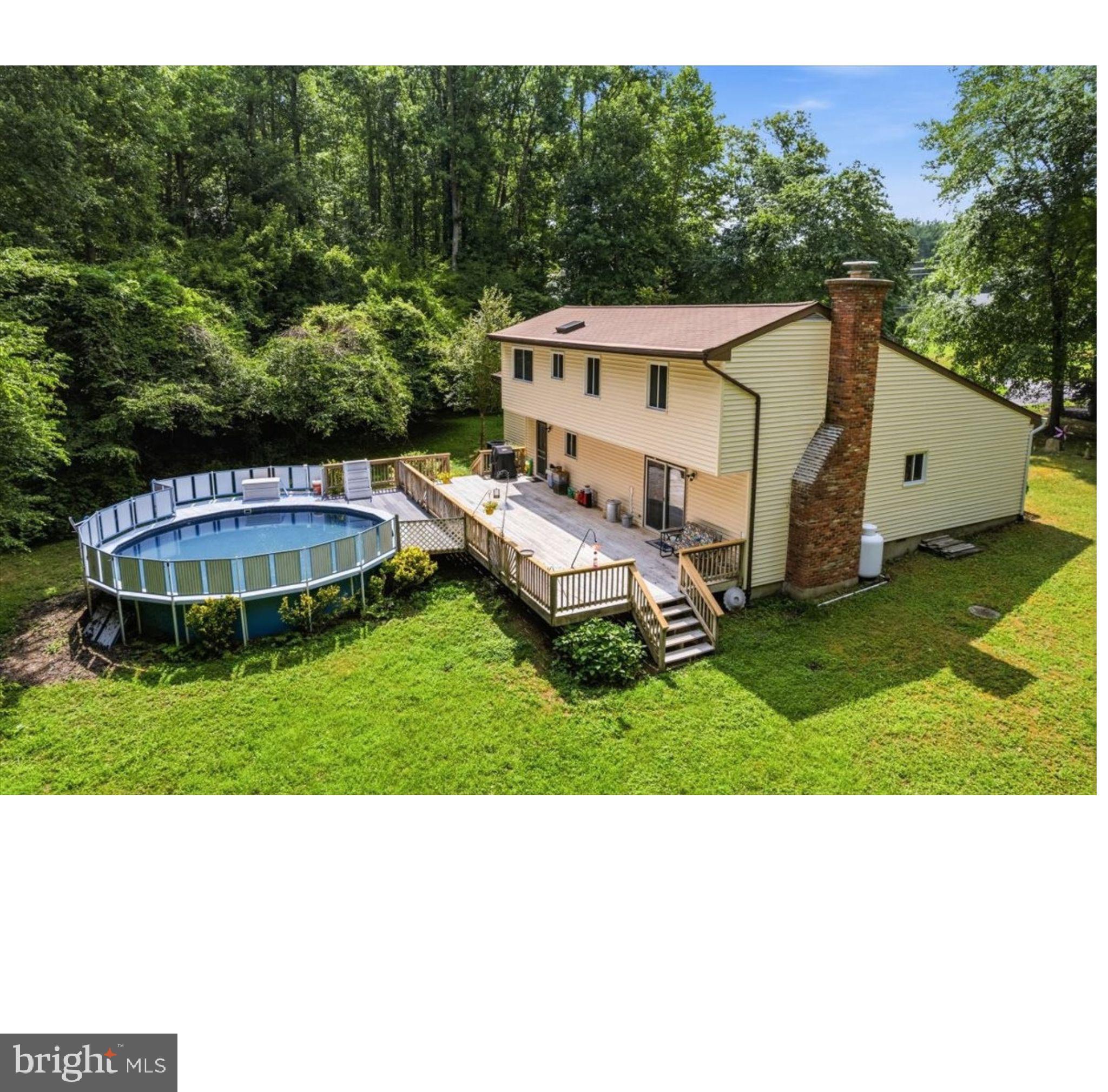Welcome home to this charming property situated on 3 flat, open acres in the heart of Huntingtown! With plenty of room to spread out both inside and out, this home offers a comfortable layout and great spaces for everyday living and entertaining.
The main level features a bright living room with cathedral ceilings, a separate dining room, and a spacious kitchen that opens to the family room. From there, step out onto the large deck overlooking the above-ground pool—perfect for summer gatherings and relaxing evenings at home. You'll also find a convenient half bath and a large laundry room with its own exterior entrance. New LVP flooring has been installed in the dining room, kitchen, foyer, and bathrooms, adding style and durability throughout these high-traffic areas.
Upstairs, the primary suite includes a private bath, while two additional bedrooms share a full hall bath.
Outside, enjoy the privacy and possibilities that come with 3 usable acres, whether you're gardening, playing, or simply enjoying the open space. Additional features include a one-car garage, an above-ground pool with a new liner and motor, and a fantastic location close to schools, shopping, and everything Huntingtown has to offer. New water softener (Aug 2023), water heater 5/6 years old, inside/outside hvac (Oct 2020), roof 8/10 years old.