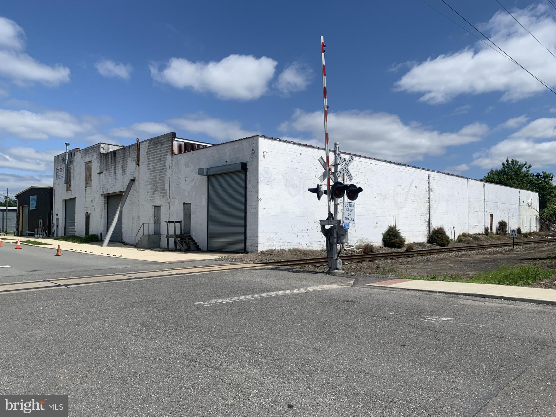 Building available.  Bring your vision to this expansive site (there is space for more than one). Desirable location in close proximity to Subaru Park and the Philadelphia Union Soccer Complex. Multiple parcels with possible subdivision opportunity. The current floor plan includes seven (7) units. The Larimer Beer Company and Taproom leases one unit under a month-to-month agreement. The adjacent lot can accommodate approximately 120 vehicles. An executed Hold Harmless Addendum is required for any interior inspection.