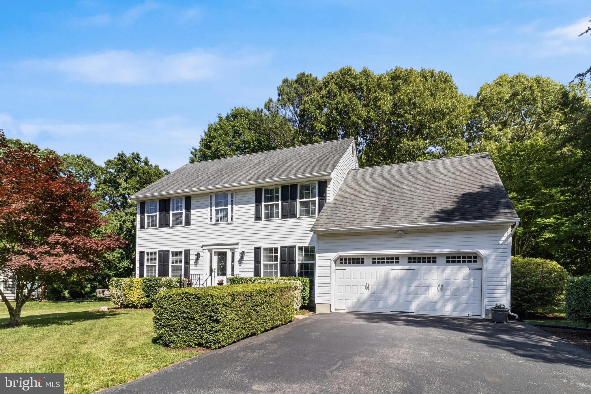 Welcome to this beautifully maintained Colonial, perfectly positioned on a private lot in one of the area's most desirable locations. From the moment you arrive, you'll appreciate the space, comfort, and thoughtful updates throughout.

The heart of the home is the stunning, upgraded kitchen featuring gorgeous countertops, accent lighting, a center island, and a spacious breakfast area—ideal for everyday living and entertaining alike. Just off the kitchen, the inviting family room offers a cozy pellet stove fireplace, creating the perfect gathering space year-round.

A separate formal dining room provides an elegant setting for hosting family and friends, while a versatile main-level living room offers the perfect space for a home office, study, playroom, or additional sitting area. The convenient main-level laundry room, half bath, and attached two-car garage add everyday functionality.

Upstairs, you'll find three generously sized bedrooms and 2 baths, including a comfortable primary suite designed for relaxation. An added bonus is the finished room above the garage, providing approximately 200+ square feet of additional living space not reflected in the tax records—ideal for a media room, fitness space, guest retreat, or home office.

Step outside and enjoy your own private retreat. The screened porch and adjoining deck overlook a peaceful backyard, offering the perfect setting for morning coffee, evening gatherings, or simply unwinding in nature. A storage shed provides additional space for tools, equipment, and seasonal items. Solar panels add an extra layer of efficiency, helping to offset energy costs while supporting a more sustainable lifestyle.

Located in a highly sought-after community with an easy commute to Washington, D.C., and Pax River, this home delivers the ideal balance of privacy, convenience, and lifestyle.