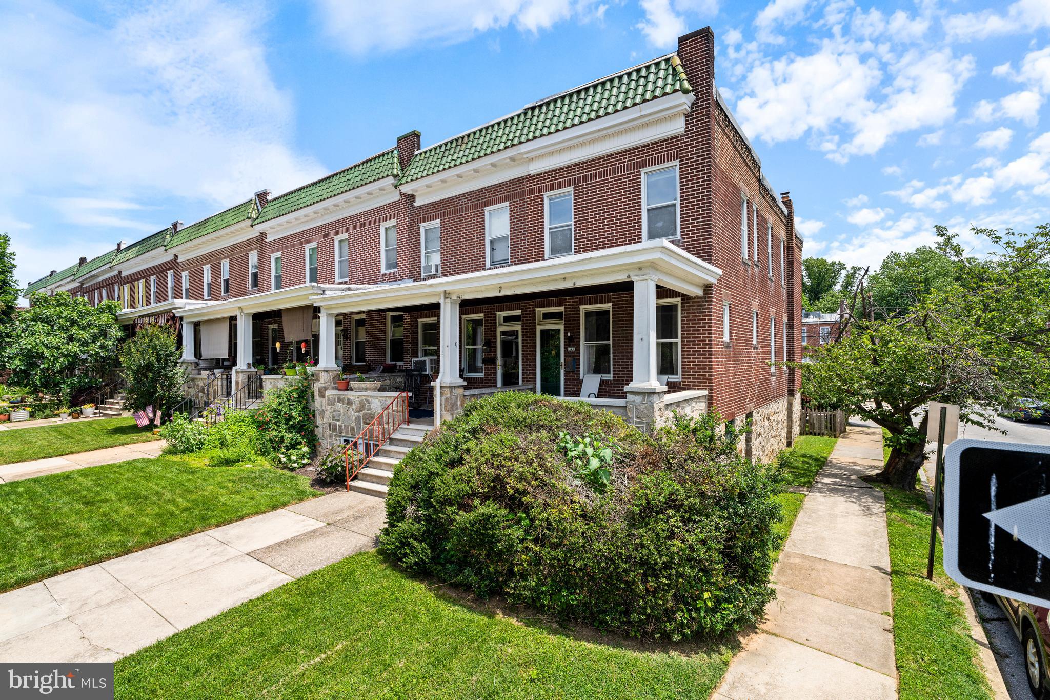Rare opportunity in the heart of Wyman Park/Stony Run! This charming south-facing end-of-group rowhome on the corner of Beech and Craycombe is flooded with natural light thanks to its abundance of windows on three sides. Inside, you'll find a fireplace, spacious living and dining rooms, a large kitchen, rear deck, and a fenced rear yard with the potential to create off-street parking if desired. The upper level is currently configured as 2 bedrooms, 1 full bath, and a spacious central living area that could easily be converted back into a third bedroom. The lower level features excellent ceiling height and two separate walkout exits—one to Craycombe Avenue and one to the rear yard—offering tremendous potential for additional finished living space, a guest suite, home office, or possible income-producing opportunity.

Just steps from Stony Run trails, Hampden, and The Avenue, this home combines historic neighborhood charm with easy access to dining, shopping, and entertainment. Estate sale being sold as-is and priced to allow the next owner to make updates and build equity in one of Baltimore's most sought-after neighborhoods. With central air conditioning already installed, buyers can focus their investment on personalizing the home rather than taking on one of the more significant upgrades often needed in older Baltimore properties.