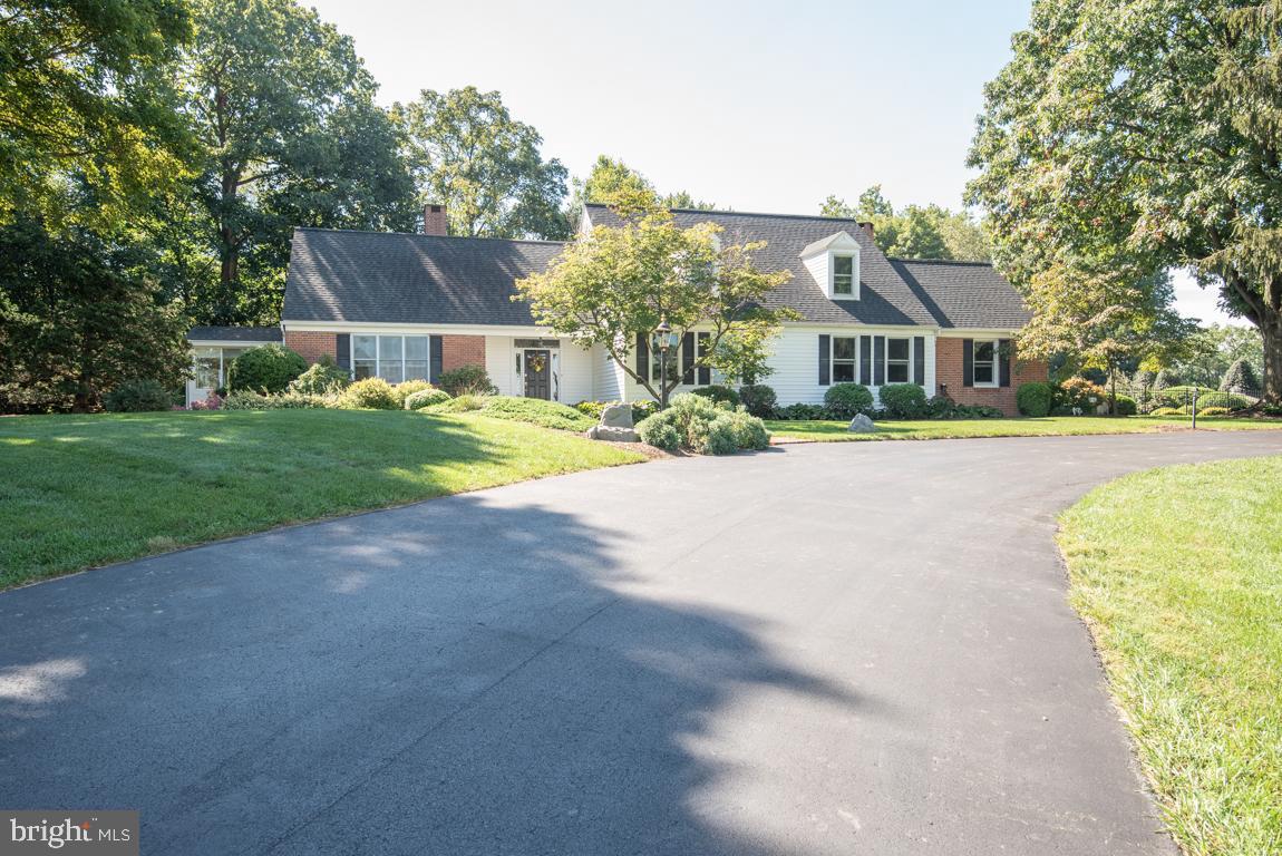 **View The Virtual Tour**
Looking for a little privacy and space to call your own?  How about a 15,000 square foot barn capable of boarding 18 horses, supporting your small business, or starting your own hobby farm?  Nestled along Little Conestoga Run in Hempfield schools this custom-built 4,200 square foot home on 9.6 acres could be your own personal oasis.  This estate is situated on the Manheim Township / Hempfield border in the heart of Lancaster County.  Close to everything, but stunningly quiet on the homestead. The exquisite salt-water pool with waterfall and extensive hardscaping will accommodate all your relaxation and outdoor entertainment whims.  Inside, this 4,200 square foot cape cod boasts four bedrooms and four full bathrooms - two of which are first floor primary suites!  Current owners have made extensive infrastructure improvements totaling over 250k in the last 7 years.  The personal touches sprinkled throughout this property are too numerous to list here.  Please enjoy our virtual tour and book your showing to see this gem firsthand.