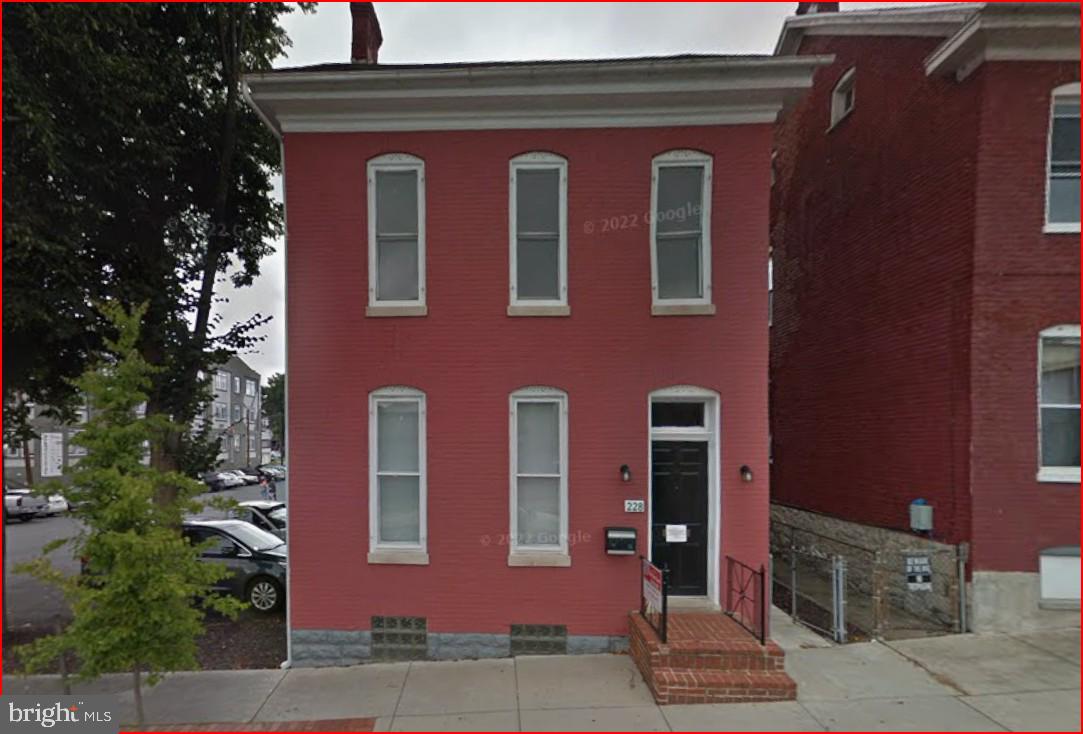 Well-maintained solid brick over-under duplex offering flexibility for both owner occupants and investors. The lower unit is currently designated for commercial use and is fully equipped with a kitchen and full bathroom, making it ideal for a small business or flexible mixed-use setup. An owner can live in the upper unit while operating a business below, creating a practical live and work opportunity. Due to the commercial component, FHA financing is not eligible.

The property also presents the potential, subject to approvals, to convert the lower level to full residential use, further expanding its income potential.

The upper unit offers a spacious three-bedroom, one-bath layout with several updates, including a remodeled bathroom and updated flooring throughout. The property has been well maintained and includes major improvements such as a roof replaced in 2019, a new heat pump installed in June 2025, and a new hot water heater in 2025. A large, privacy fenced yard adds to the overall appeal.

Centrally located with excellent accessibility, this property provides multiple strategies, whether for owner occupancy, rental income, or mixed-use, with strong long-term upside.