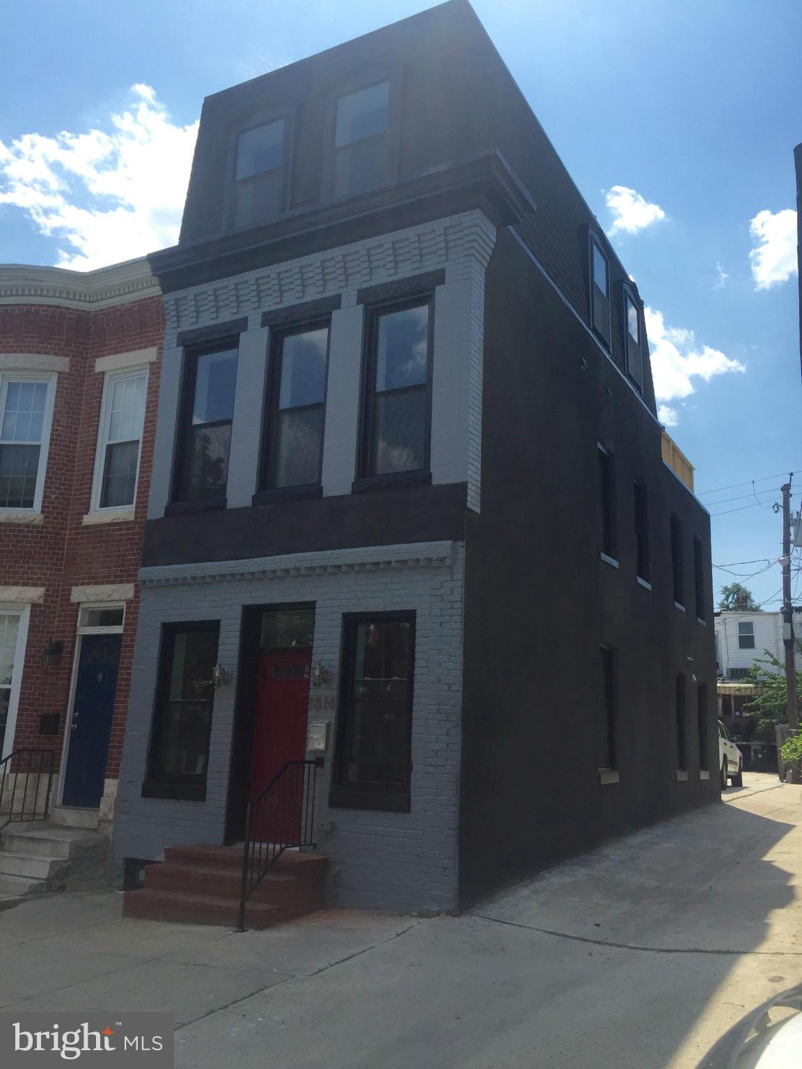 Almost 2000 sq feet of living space in this four level, totally renovated end unit home with TWO CAR PARKING. 4BR , 3BA, roof top deck. Tons of character with its high ceilings and lots of natural light.  New hardwood floors, granite countertops, SS appliances, exposed brick. One block from Riverside Park and close to shopping and dining.