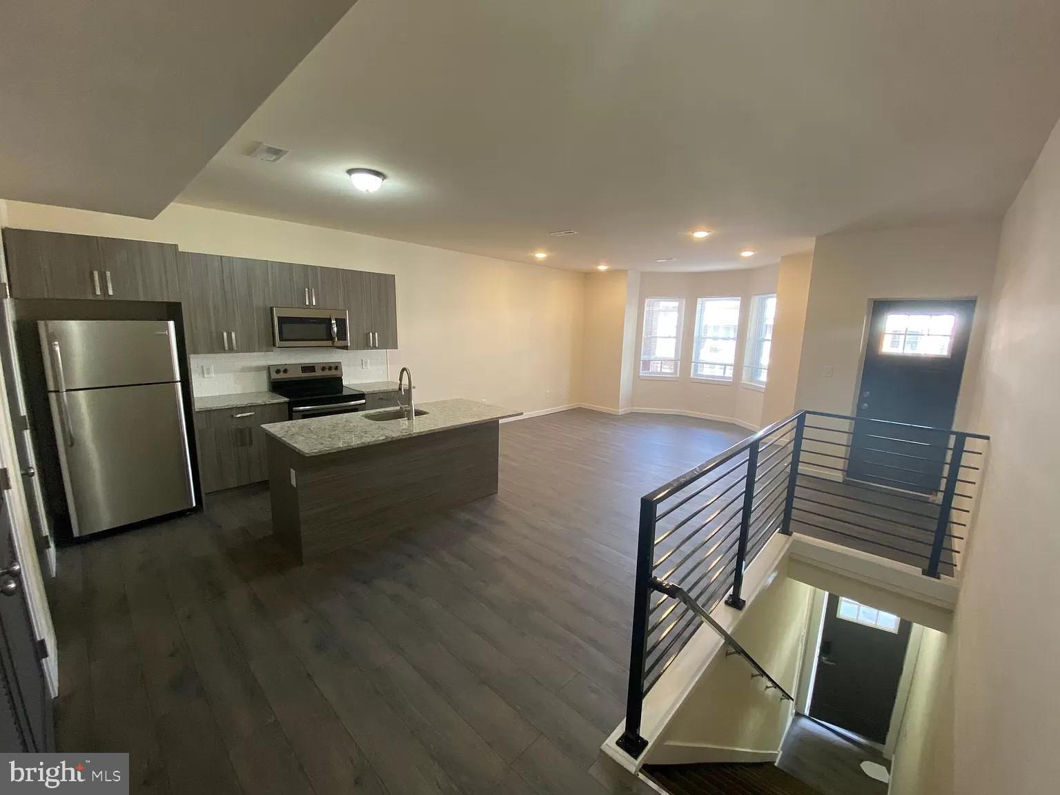 Welcome to this charming rental unit located in the heart of Philadelphia, Pennsylvania. Situated just a stone's throw away from the vibrant city center, this 2-bedroom and 2-bathroom unit offers a comfortable and convenient living space. Inside, you'll find immaculate hardwood flooring throughout, creating a warm and inviting ambiance. Additional features of this home include central air conditioning, a spacious backyard perfect for outdoor gatherings, and a fully-equipped kitchen with granite countertops and a refrigerator. The unit also includes a washer and dryer for added convenience. Tenants have the option to sign a 12, 18, or 24-month lease, while standard utilities such as electric (PECO), gas (PGW), and a flat-rate water fee are applicable. Managed by an elite property management company, tenants will have access to a convenient online tenant portal for effortless payment and maintenance request management. Don't miss the opportunity to make this wonderful rental unit your next home.
