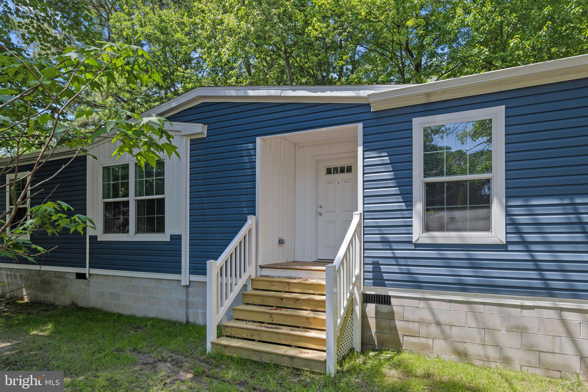 Welcome to coast living, just 3 miles from Bethany Beach! Situated on a beautiful lot with full mature trees in an established neighborhood with a covered back porch. This brand-new 3-bedroom 2-bath home offers 1707 square feet of living space, perfect for year-round living, a vacation retreat, or an investment property. This home features an open-concept floor plan, spacious living area, kitchen island, office space, a large walk-in pantry, and a covered back porch--equipped with forced hot air heat and central air for year-round comfort. Conveniently located just minutes from the shopping, dining, entertainment, and shoreline of Bethany Beach, this home offers the perks of coastal living without the premium price, plus low HOA fees. Schedule your tour today!