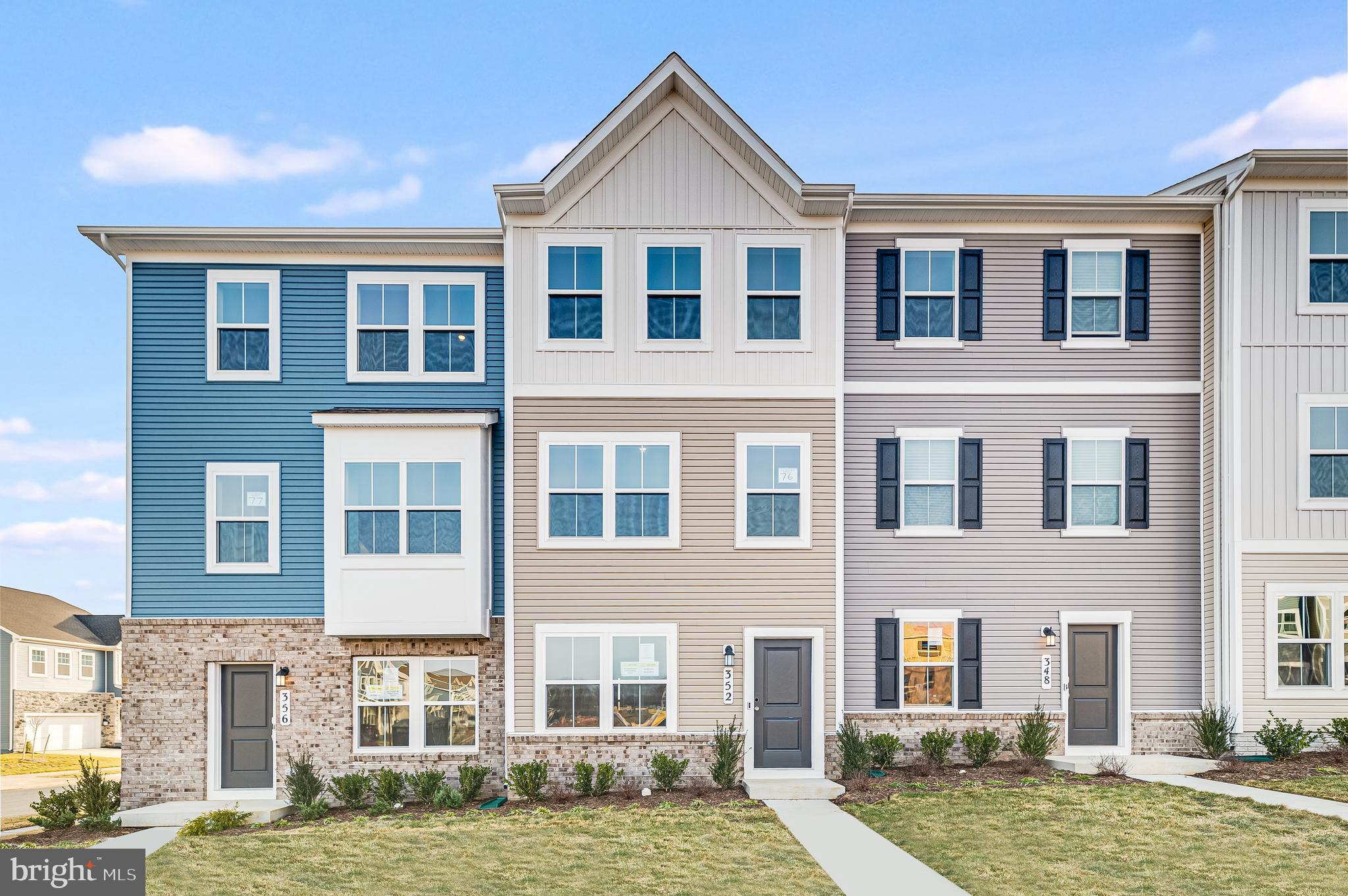 NOVEMBER 2026 DELIVERY! Welcome to modern, low-maintenance living in Shenandoah Springs, ideally located in the heart of Ranson, WV! The Quincy floorplan by Lennar offers three thoughtfully designed levels, a rear-load 1-car garage, 3 bedrooms, and 3 full baths. The entry level features a private bedroom and full bathroom, ideal for guests, a home office, or flexible living space. The main level showcases an open-concept design connecting the spacious Great Room and dining area to a stylish rear kitchen featuring Valle Nevado granite countertops, Frigidaire stainless steel appliances, 9-foot ceilings, and Barnett Duraform cabinetry in Linen. Step outside and enjoy additional outdoor living space on the 10x12 deck. Upstairs, you’ll find two bedrooms, including a spacious owner’s suite with a generous walk-in closet and private spa-inspired bathroom. A second bedroom, full hall bath, and convenient laundry area with washer and dryer included complete the upper level. Shenandoah Springs offers planned community amenities including a tot lot, basketball court, future swimming pool, civic park, and trails. Conveniently located near historic Harpers Ferry, shopping, dining, commuter routes, outdoor recreation, and all that Jefferson County has to offer. Photos are for illustrative purposes only and may depict a similar home. Prices, features, and availability are subject to change without notice.