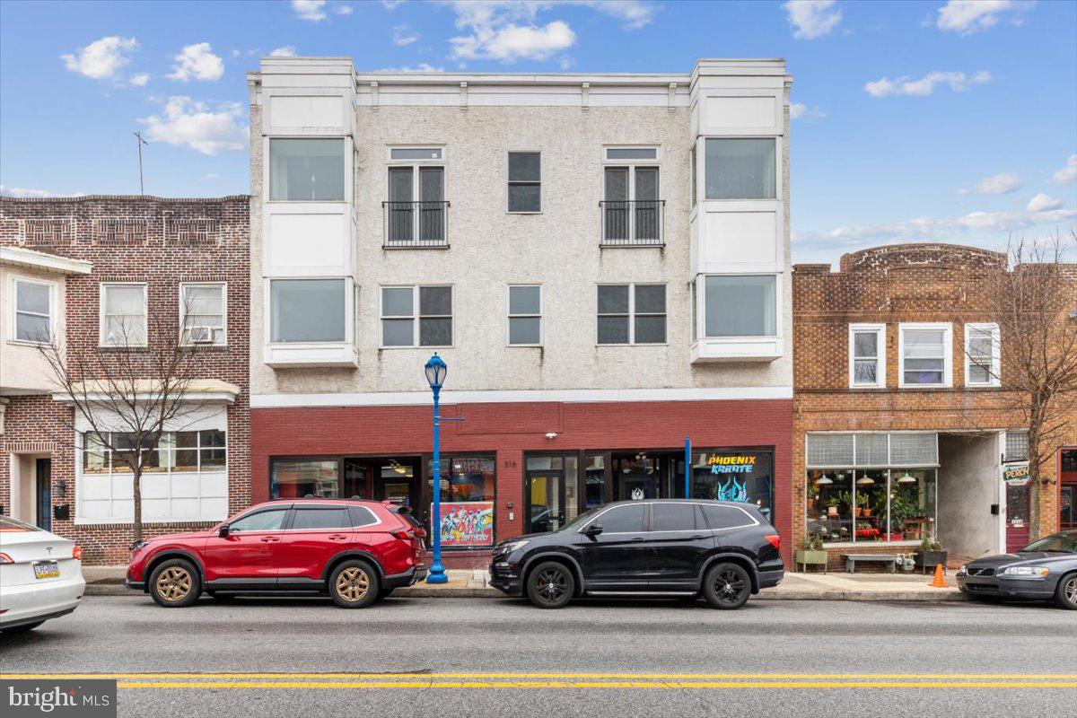 316 Bridge Street is a mixed-use building in the heart of downtown Phoenixville with excellent exposure and foot traffic. It consists of street level retail space and 9 apartments.  The street level is currently leased to  a single tenant but can easily separated into 2 spaces each facing Bridge Street and with their own entrance.  The apartments consist of studios, 1 and 2 bedrooms, all recently updated and including in-unit washers & dryers. All units are individually metered for electricity. There is a parking lot in the rear of the building that includes 8 spaces.  The upper 2 floors of the building were added in 2014 and were developed to be a long-term investment requiring minimal maintenance.  There is also an unfinished basement providing space for storage or expansion. Phoenixville is an excellent place to either locate your own business or find retail tenants.  In addition, the apartments are in demand and offer stable tenants. The restaurants, shops, bars and festivals nearly every weekend attract a loyal local clientele as well as people looking to live where the action is!