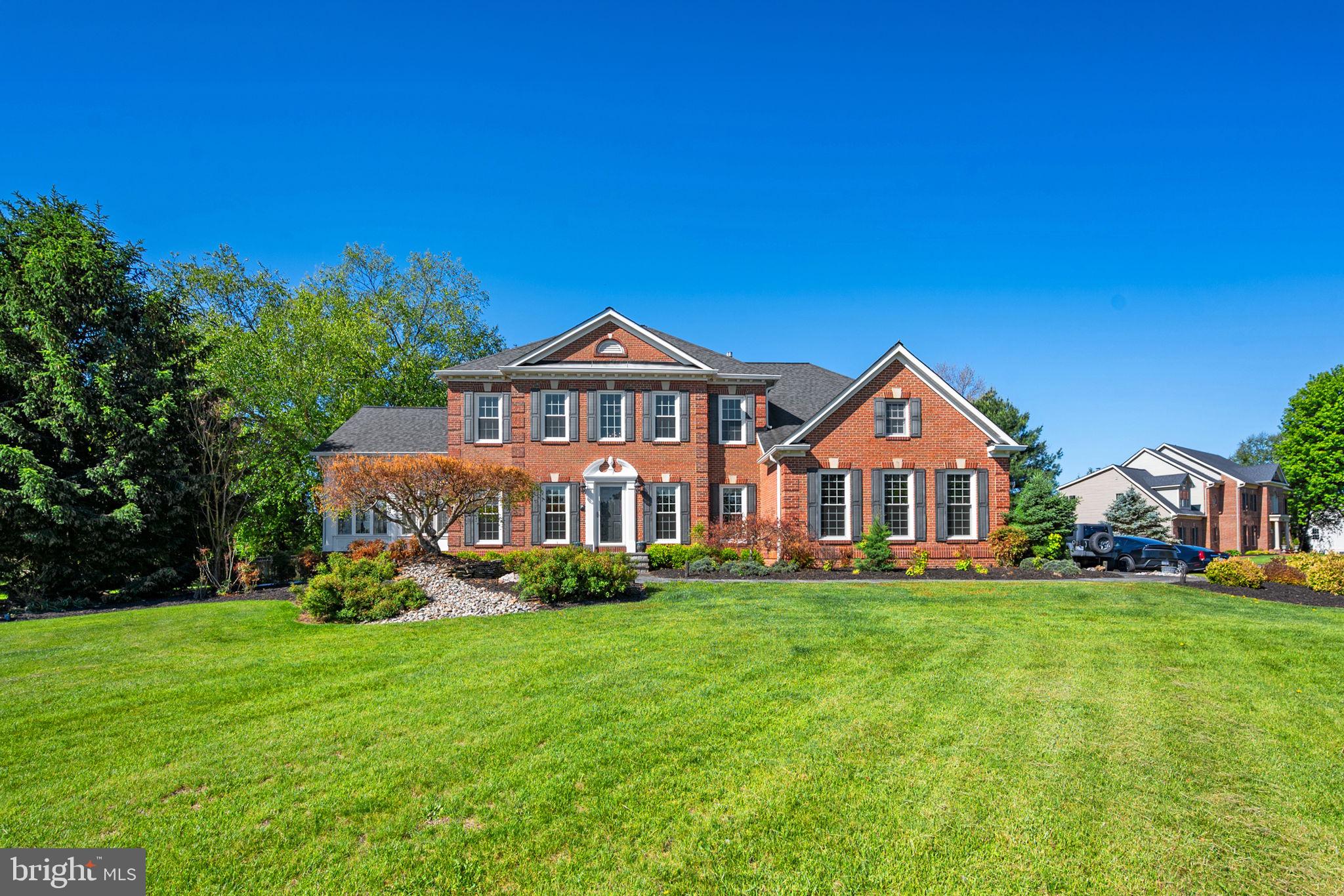 Welcome to this beautifully maintained NV Homes Moreland model located on a picturesque 2-acre lot in the highly sought-after Brookeville Farms community in Brookeville. The main level features hardwood floors, extended crown molding, and thoughtfully designed living spaces ideal for both everyday living and entertaining. A formal dining room and powder room complement the spacious layout, while the gourmet eat-in kitchen offers a large center island, quartz countertops, custom tile backsplash, Wolf induction cooktop, KitchenAid stainless steel double ovens, GE Profile French door refrigerator and microwave, and KitchenAid dishwasher. The kitchen opens seamlessly to a dramatic two-story great room with a floor-to-ceiling stone fireplace and French doors leading to a large Brazilian hardwood deck overlooking the beautifully manicured backyard. A stunning two-story sunroom with French doors opens to an additional deck, creating even more space to relax and entertain, while a private office and a mudroom/laundry room with access to the two-car garage complete the main level. <br> <br>

Upstairs, the spacious primary suite features a cathedral ceiling, two walk-in closets, and a luxurious bathroom with soaking tub, separate shower, water closet, double vanity, and heated floors. Three additional generously sized bedrooms with large closets and a full hall bath provide comfortable accommodations for family and guests. <br> <br>

The finished lower level expands the home’s versatility with a spacious fifth bedroom, full bathroom, dedicated gym, recreation room, and multiple storage areas. Nine-foot ceilings on all three levels enhance the home’s open and airy feel throughout. <br> <br>

The property’s curb appeal is highlighted by its sprawling two-acre setting, meticulously landscaped front yard, flagstone walkway, and newly updated front porch. The backyard offers two decks and beautifully maintained gardens, creating a peaceful outdoor retreat perfect for gatherings or quiet enjoyment. Major improvements include a new roof and gutters (2019), all windows replaced (2013), updated kitchen finishes, renovated bathrooms, multiple HVAC system upgrades, a 75-gallon water heater (2021), sump pump (2018), replaced well pump, fresh interior paint throughout, and brick mailbox pillars with limestone slabs.  <br> <br>

Homes in Brookeville Farms are set on two or more acres and feature wide sidewalks ideal for jogging, dog walking, or leisurely strolls through the neighborhood. The location offers convenient access to shopping, dining, and everyday amenities in nearby Olney, with easy connections to the Intercounty Connector (ICC/MD-200), I-95, and I-270 for commuting to Washington, DC, Baltimore, and surrounding employment centers. Lovingly maintained and thoughtfully updated, this exceptional property offers space, comfort, and timeless appeal in one of the area’s most desirable communities. Schedule your tour now!