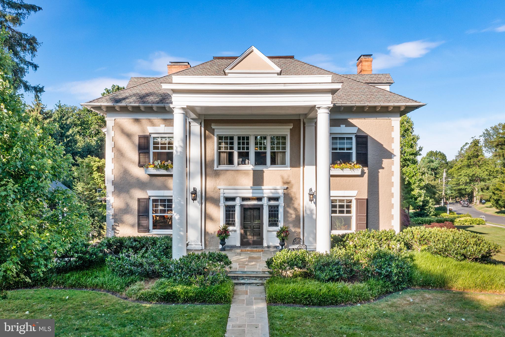 Experience elegant living in the heart of Wayne with this exquisite home that seamlessly blends old-world charm with modern amenities. This stunning residence captures the essence of a bygone era while providing all the conveniences of contemporary living. 
Crown molding, millwork and architectural details add elegance and sophistication while high ceilings create a sense of grandeur and spaciousness throughout the home. This home boasts hardwood floors from bottom to top and features 6 large bedrooms, perfect for accommodating family or guests. The third floor offers a cozy space perfect for spending time together watching TV or game night.
A great porch extends the living area of the home, providing a welcoming space for relaxing, dining, or enjoying the outdoors. Once, outside, the manicured landscaped grounds feature lush gardens, pool, pool house with powder room and patios for spacious entertaining.

Located in the heart of Wayne this home is perfect for walking to shopping, dining and commuting combined with its impeccable upkeep 339 Louella is a perfect place to call home.