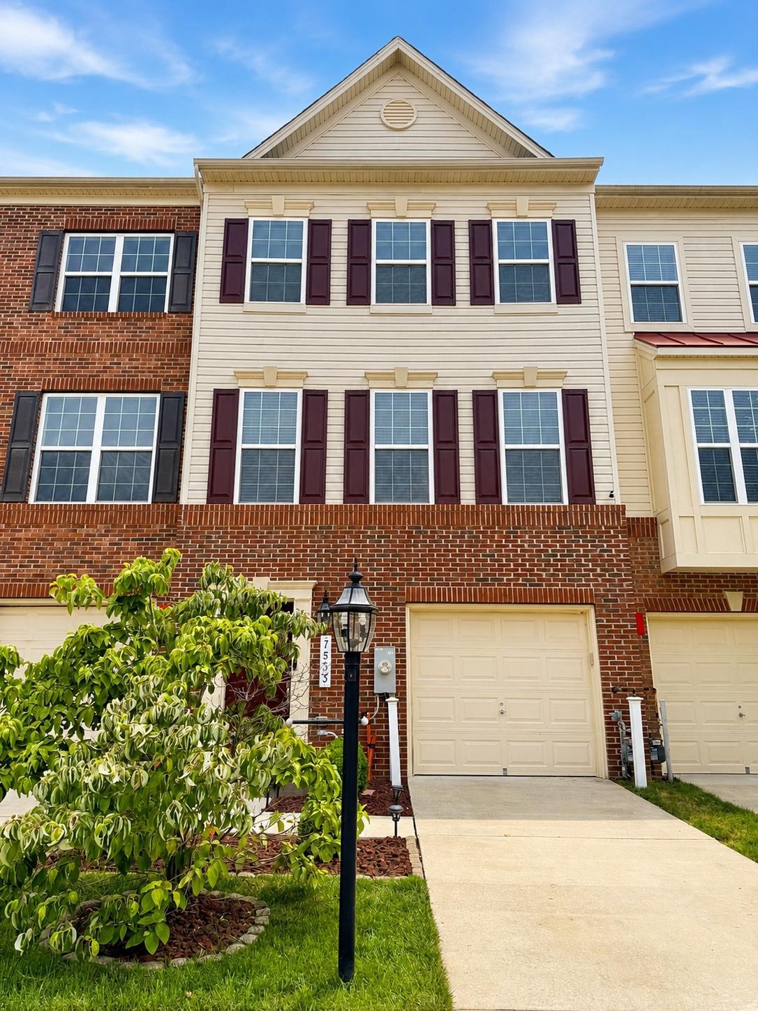 ****OPEN HOUSE SATURDAY JULY 18TH 1PM - 3PM****

Welcome to 7533 Ivybrook Lane, a beautifully maintained three-level townhome offering approximately 2,200 square feet of thoughtfully designed living space in the desirable Tanyard Springs community. Spacious interiors, exceptional outdoor living, and a convenient location come together to make this home truly stand out.

The entry level features a versatile recreation room ideal as a second living area, home office, fitness space, or media room, along with a convenient half bath, interior garage access, and walkout access to the fully fenced backyard with a paver patio.

The main level showcases an expansive open-concept design connecting the living room, dining area, and an oversized kitchen that serves as the heart of the home. Featuring abundant cabinetry, generous counter space, and a large center island, the kitchen is designed for everyday living and entertaining. A second half bath completes this level.

Upstairs, the spacious primary suite offers a private en-suite bath and walk-in closet, while two additional bedrooms, a second full bath, and bedroom-level laundry provide everyday convenience.

The outdoor space is a standout feature, with a low-maintenance Trex deck overlooking the fully fenced backyard and paver patio. The home backs to permanent woods, providing a natural backdrop with no homes directly behind the property and seasonal afternoon shade for added outdoor enjoyment.

Conveniently located approximately 0.15 miles from Solley Elementary School, the home also offers easy access to I-695 and is about 20 minutes from Baltimore's Inner Harbor, professional sporting events, concerts, museums, restaurants, and entertainment. Tanyard Springs Park, a new Anne Arundel County park, features a playground, pavilion, baseball field, and soccer field.
Residents enjoy outstanding community amenities including more than 110 acres of common area, a clubhouse, outdoor pool with toddler pool, 24-hour fitness center, tennis courts, basketball court, four playgrounds, three dog parks, walking trails, two pavilions, a community garden, and a play field.