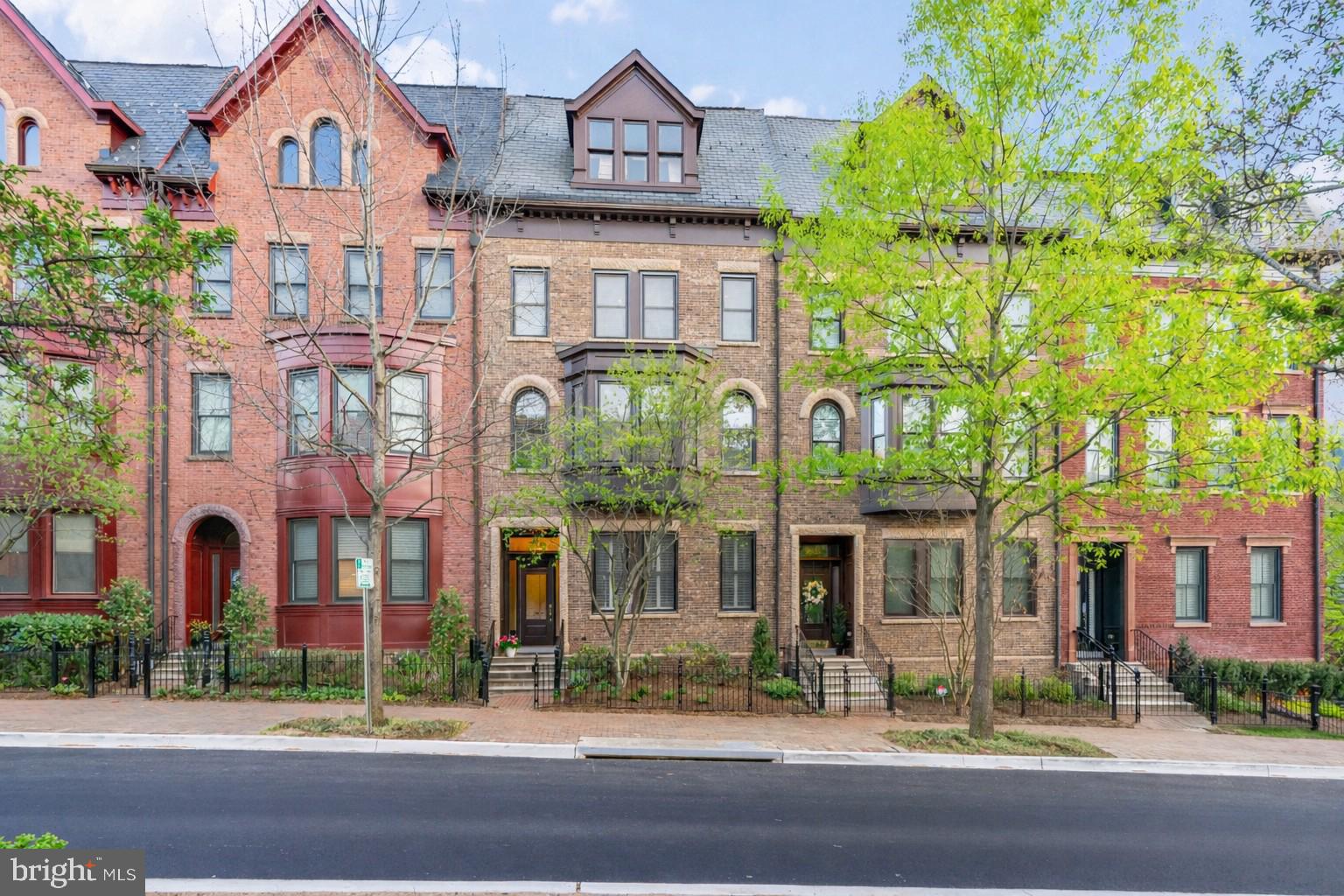 A rare opportunity to own a prestigious "Lincoln" model Brownstone in Park Potomac one of only 12 in the entire subdivision. This spacious, ELEVATOR-ready residence greets you with an airy main level featuring rich hardwood flooring, custom crown molding, and a seamless flow from the ceremonial dining room to the grand living area. The heart of the home is a chef's kitchen equipped with a six-burner Viking stove, KitchenAid appliances, and a light-filled family room with a gas fireplace leading to a private balcony. The second level serves as a sanctuary, featuring a massive owner's suite with dual walk-in closets and a spa-like natural marble bathroom complete with a soaking tub. Two additional bedrooms and a full laundry room complete this floor. The fourth-level loft boasts a fourth bedroom, an office, a full bathroom and huge entertainment zone, that opens to an expansive roof terrace with stunning treetop views. The lower level offers versatility with a home gym, media room, and a two-car garage featuring both wheelchair lift and elevator access. Enjoy luxury amenities at your doorstep, including a pool, clubhouse, Harris Teeter, and fine dining, all with easy access to I-270 and I-495. Prestige and comfort in one place!