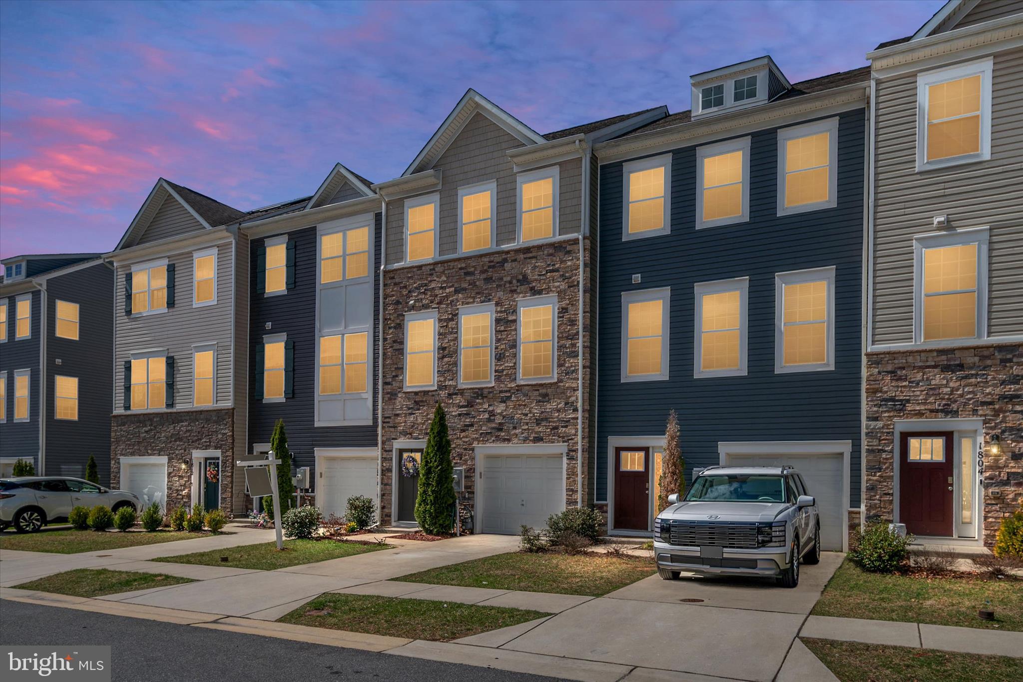Welcome to 1808 Kellington Ct in Odenton — an expansive and well-appointed townhome offering approximately 1,940 square feet of stylish living space across three finished levels. With 3 bedrooms and 2.5 full baths, this home combines modern design, comfortable living, and a highly convenient location.

The heart of the home is the beautifully designed kitchen featuring dark wood cabinetry, stainless steel appliances, granite countertops, and a large center island with seating. The open-concept layout flows seamlessly into the dining and living areas, creating the perfect setup for everyday living and entertaining alike.

The spacious primary suite offers a relaxing retreat, complete with an en-suite bath featuring a double vanity, generous storage, and elegant lighting. Multiple living spaces throughout the home provide flexibility for a TV room, home office, workout area, or cozy lounge space. Large windows bring in abundant natural light, enhancing the bright and airy feel throughout.

Thoughtful features include ample storage, a walk-in closet with built-in shelving, and a practical floor plan that offers separation of space while maintaining an open, inviting feel.

Ideally located near Ft. Meade, Annapolis, Baltimore, and Washington, DC, this home offers exceptional commuter convenience. The MARC train is less than a 5-minute drive away, making travel to DC and Baltimore even easier. The community also features a tot lot, adding to the neighborhood appeal.

This is a fantastic opportunity to own a spacious, modern home in one of Odenton’s most convenient locations.