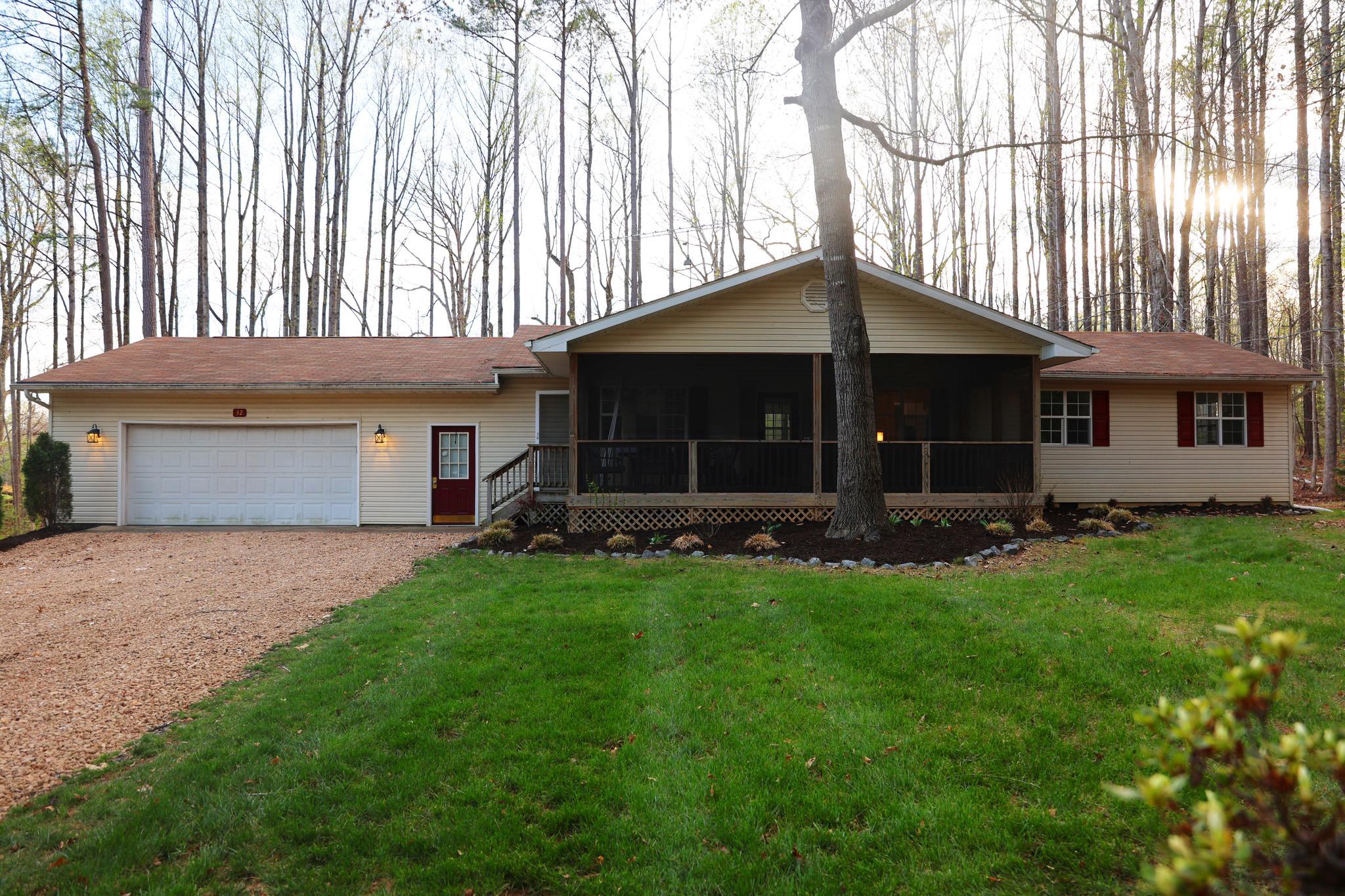 Get ready for lake living just in time for summer on the public side of Lake Anna! This updated 4-bedroom, 2-bath home features fresh paint throughout, new luxury vinyl flooring, and updated bathroom vanities. The spacious eat-in kitchen offers stainless steel appliances, an island, and plenty of room for everyday living and entertaining.
Enjoy grilling and outdoor gatherings on the rear deck overlooking the partially fenced backyard. Start your mornings with coffee on the screened front porch and unwind there in the evenings. An oversized attached garage provides ample space for vehicles, storage, and all your lake toys.
Conveniently located in a lake-access community, residents enjoy access to a picnic pavilion, boat ramp, and tot lot. Just minutes from Route 522 and popular Lake Anna restaurants, accessible by both car and boat. Don't miss this opportunity to enjoy the Lake Anna lifestyle all season long!
