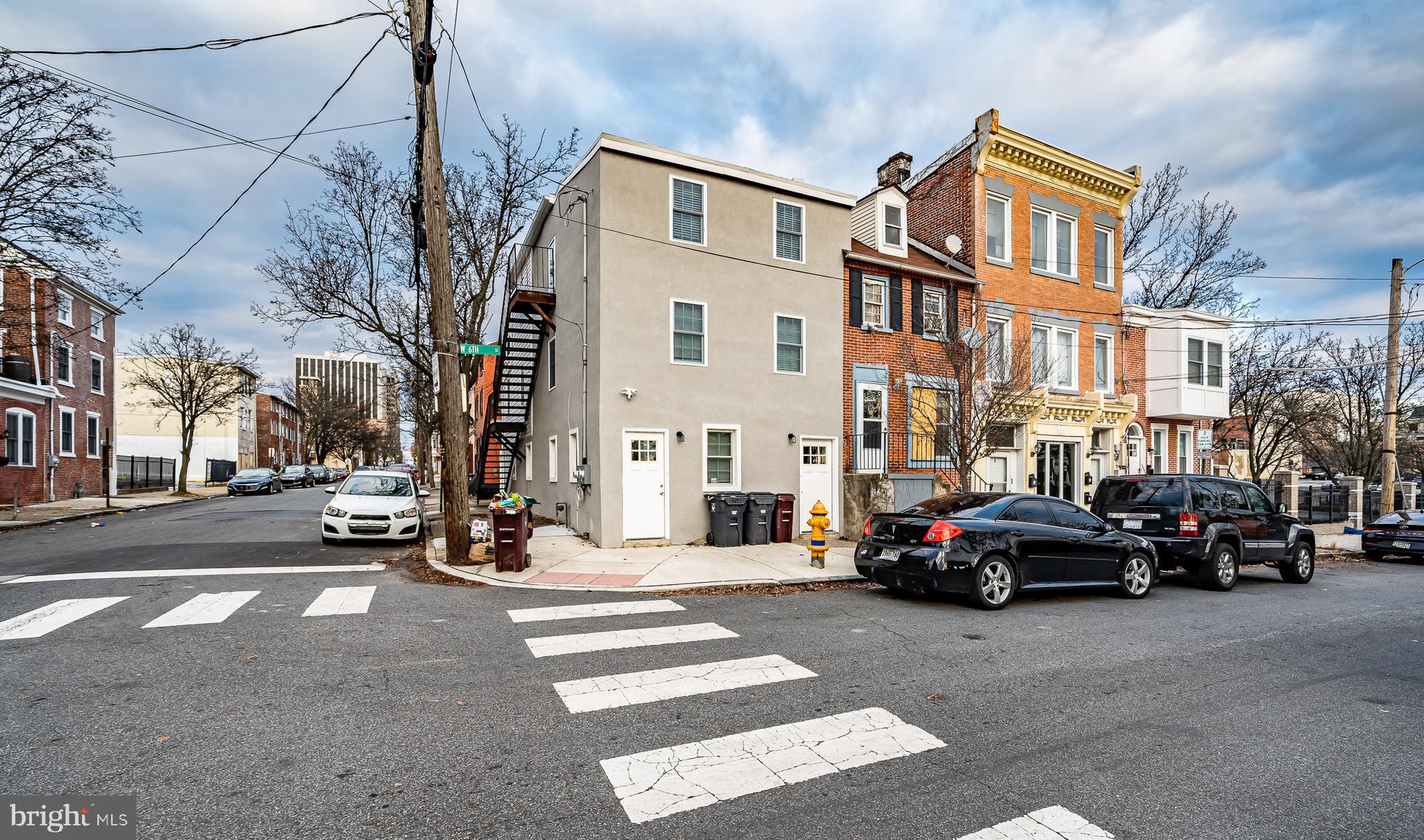 Recently renovated in 2023, this side-by-side duplex offers an incredible opportunity for investors or savvy house hackers! Previously used as an Airbnb for the past two years, this property is move-in ready and perfectly located just two blocks from the Market Street Mall, Del Tech Community College, Wilmington's business district, major hospitals, and I-95.

Unit 1 features convenient one-floor living on the main level with 1 bedroom, 1 bathroom, a living room, kitchen, and access to an unfinished basement for additional storage. Unit 2 has a private entrance leading upstairs to a full kitchen, living room, small dining area, hall laundry closet, one bedroom, and a bathroom. The third floor offers three additional bedrooms and a second full bathroom.

Utilities are separate, making this an ideal live-in and rent opportunity. Live in one unit and rent the other to offset your mortgage or add to your investment portfolio.

Don't miss your chance to own a turn-key duplex in the heart of Wilmington!