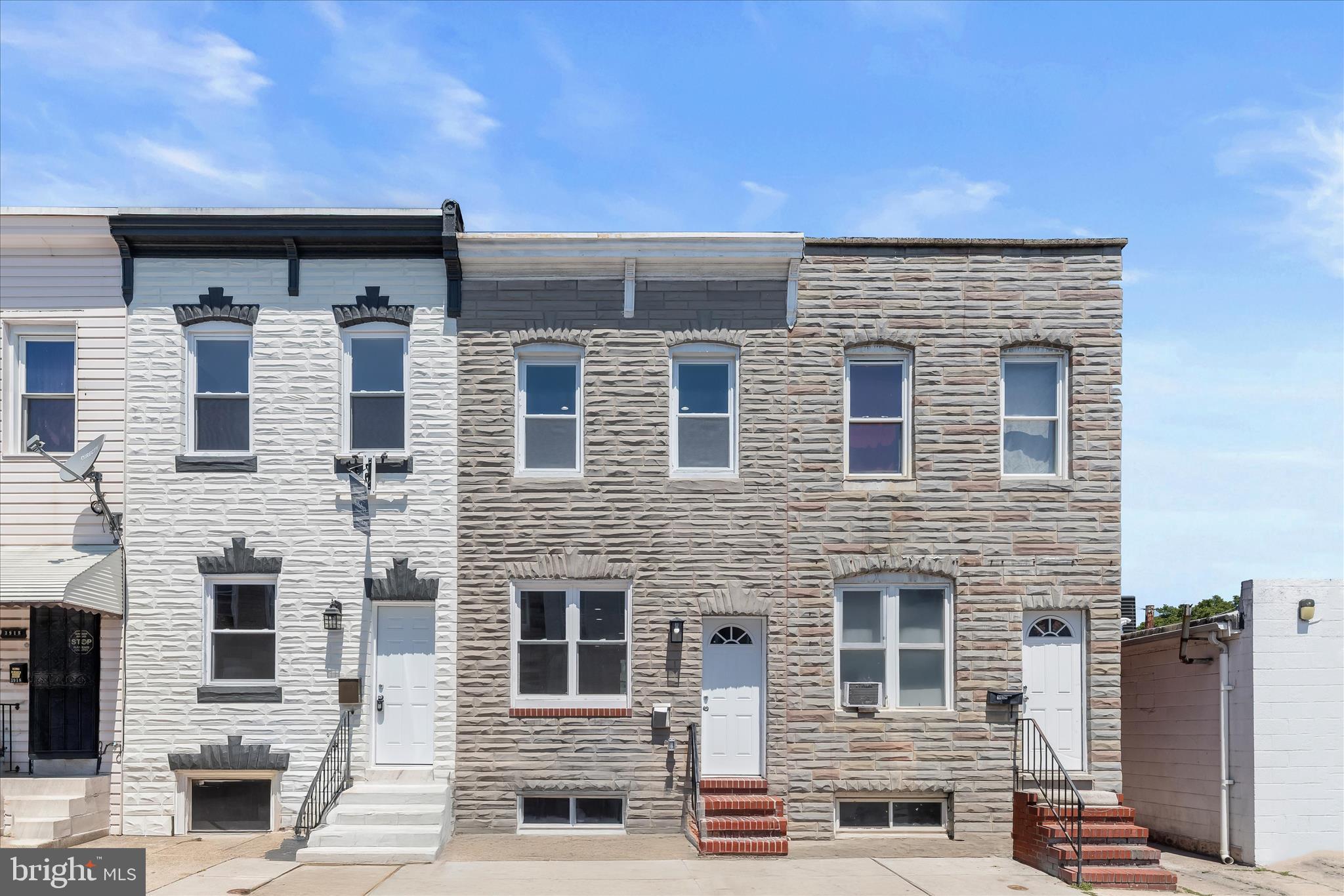 Newly renovated and move-in ready, this stylish 2-bedroom, 2.5-bath rowhome is ideally situated in the vibrant Canton-Highlandtown neighborhood. The classic Baltimore formstone exterior welcomes you inside to a sunny, open-concept main living level showcasing a modern neutral color palette, recessed lighting, fresh paint, and on-trend 9” wide plank wood-inspired LVP flooring that creates a cohesive designer feel throughout. Brand-new windows installed in 2026 fill the space with natural light, enhancing the bright and inviting atmosphere.

The spacious living and dining areas seamlessly flow into the beautifully renovated kitchen, completed in 2026 and thoughtfully designed with gleaming quartz countertops, stainless steel appliances, decorative tile backsplash, and continued LVP flooring. Just beyond the kitchen, the private rear area offers the potential to create a charming courtyard-style patio retreat perfect for outdoor dining or relaxing. A renovated powder room adds everyday convenience to the main level.

Upstairs, the tranquil sleeping quarters include a primary suite featuring recessed lighting and an updated en suite bath complete with a walk-in shower, new vanity, and new flooring. A second bedroom and an additional full bath complete the upper level.  The unfinished basement with laundry hookups provides abundant storage space and offers the opportunity to customize and finish the area to suit your lifestyle needs.  Extensive 2026 renovations—including a new roof, HVAC system, water heater, windows, kitchen renovation with appliances, and updated bathrooms—make this pristine home feel virtually brand new while delivering the charm and character of classic Baltimore rowhome living.
Note:  Select interior photos have been virtually staged