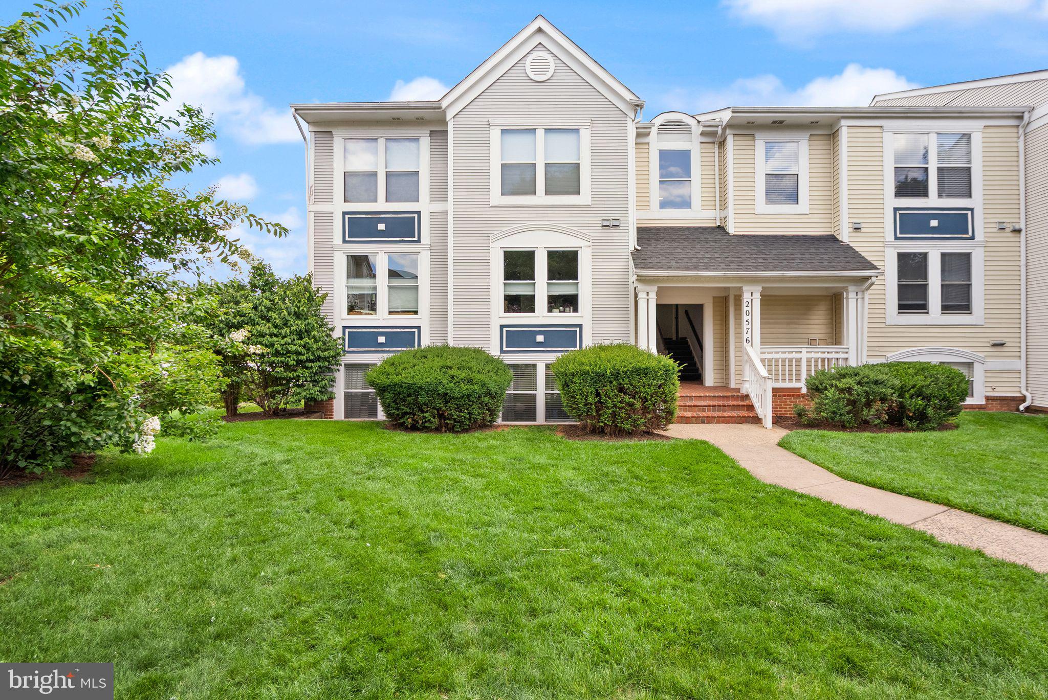 Welcome to this stunningly renovated penthouse condominium with over $100,000 in luxurious, top of the line upgrades. A true unicorn of Ashburn Village! The kitchen is a showstopper, walls have come down, opening this floorplan up while creating a culinary dream that is perfect for entertaining. No expense was spared with soft close cabinetry, quartz counters and island, elegant tile backsplash, stainless steel appliances, and expanded pantry. The family room boasts  soaring custom coffered ceilings and crown molding that are backlit creating incredible ambience, a gas fireplace, and the first of two balconies overlooking the lake, manicured grounds and the pool. Luxury vinyl plank flooring runs through the main living areas into the bedrooms.  The primary suite is a sanctuary of its own, featuring a walk-in closet with custom built-ins, a flush mount chandelier with ceiling fan, and access to the second balcony where you can enjoy your morning coffee. The ensuite bath has been beautifully updated with a frameless glass doored shower, gorgeous tiling, vanity and Bluetooth-enabled mirror. So pretty! The generously sized secondary bedroom has a huge walk-in closet with custom built-ins too. All of this with a 2 year new HVAC and Hot Water Heater. This unit also includes a storage closet in the lower level storage room, parking space 14A302 plus ample guest parking.

Ashburn Village is an award winning amenity-rich community featuring 3 community recreation centers with outdoor pools, tennis, pickleball, basketball, multipurpose courts, 9 playgrounds, 50 miles of scenic trails, baseball and soccer fields, a fit trail, over 500 acres of open outdoor space, as well as 8 lakes and ponds for catch and release fishing and canoeing. The hallmark Sports Pavilion is one of the largest community recreational facilities of its kind with indoor and outdoor pools, fitness center and classes, aquatics and youth programs. This property is convenient to shopping centers and major commuting routes and only 4 miles to the metro, 3 miles to One Loudoun, 2 miles to Whole Foods ;) 10 miles to Dulles International.