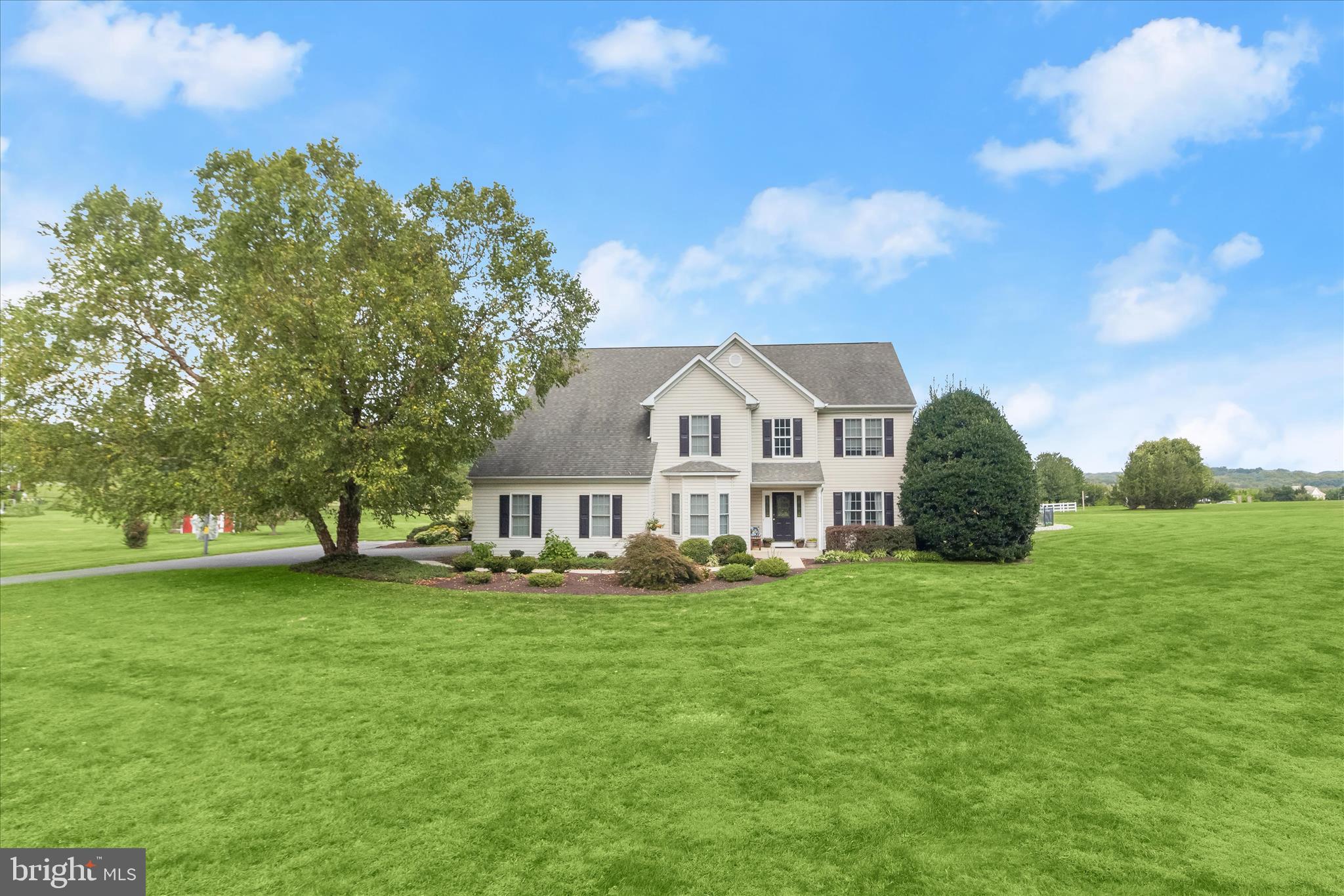 Brand New Septic Field 2026!! Experience luxury living in this stunning colonial set on a premium 2.6-acre homesite, offering a private, tree-lined retreat complete with an in-ground swimming pool and scenic views. With over 4,000 square feet of luxurious living space and extensive updates including two new HVAC systems, renovated bathrooms, refinished hardwood floors, updated appliances, and more, this home seamlessly blends timeless elegance with modern comfort.  A dramatic two-story grand foyer welcomes you, opening to formal living and dining rooms adorned with accent molding, architectural columns, and beautifully refinished hardwood flooring. The gourmet kitchen is designed to impress, featuring a gas cooktop island, granite countertops, soft-close wood cabinetry, newer stainless steel appliances, and a sun-filled breakfast area. Glass French doors lead to a bright and airy sunroom with direct access to the backyard oasis. The kitchen flows effortlessly into the soaring two-story family room, highlighted by a striking rustic stone fireplace and an upper-level overlook. A private home office and stylish powder room complete the main level.Upstairs, the expansive primary suite offers a vaulted ceiling, spacious walk-in closet, and a luxurious en suite bath with soaking tub, dual vanity, separate shower, and private water closet. Three additional generously sized bedrooms, a beautifully appointed hall bath, and a convenient upper-level laundry room provide comfort and functionality for everyday living.  The finished lower level is designed for both relaxation and entertainment, featuring a spacious recreation room with French doors that open to a wide staircase leading to the backyard, a dedicated home theater, a full bath, and abundant storage.  Outdoors, enjoy your own private oasis on 2.6 landscaped acres with an in-ground swimming pool framed by mature trees and peaceful views, perfect for entertaining or quiet retreat. A two-car garage and extended turnaround driveway add convenience, while the ideal location offers easy access to major commuter routes, shopping, dining, and entertainment.  Luxury, privacy, and thoughtful updates come together to create an exceptional place to call home.