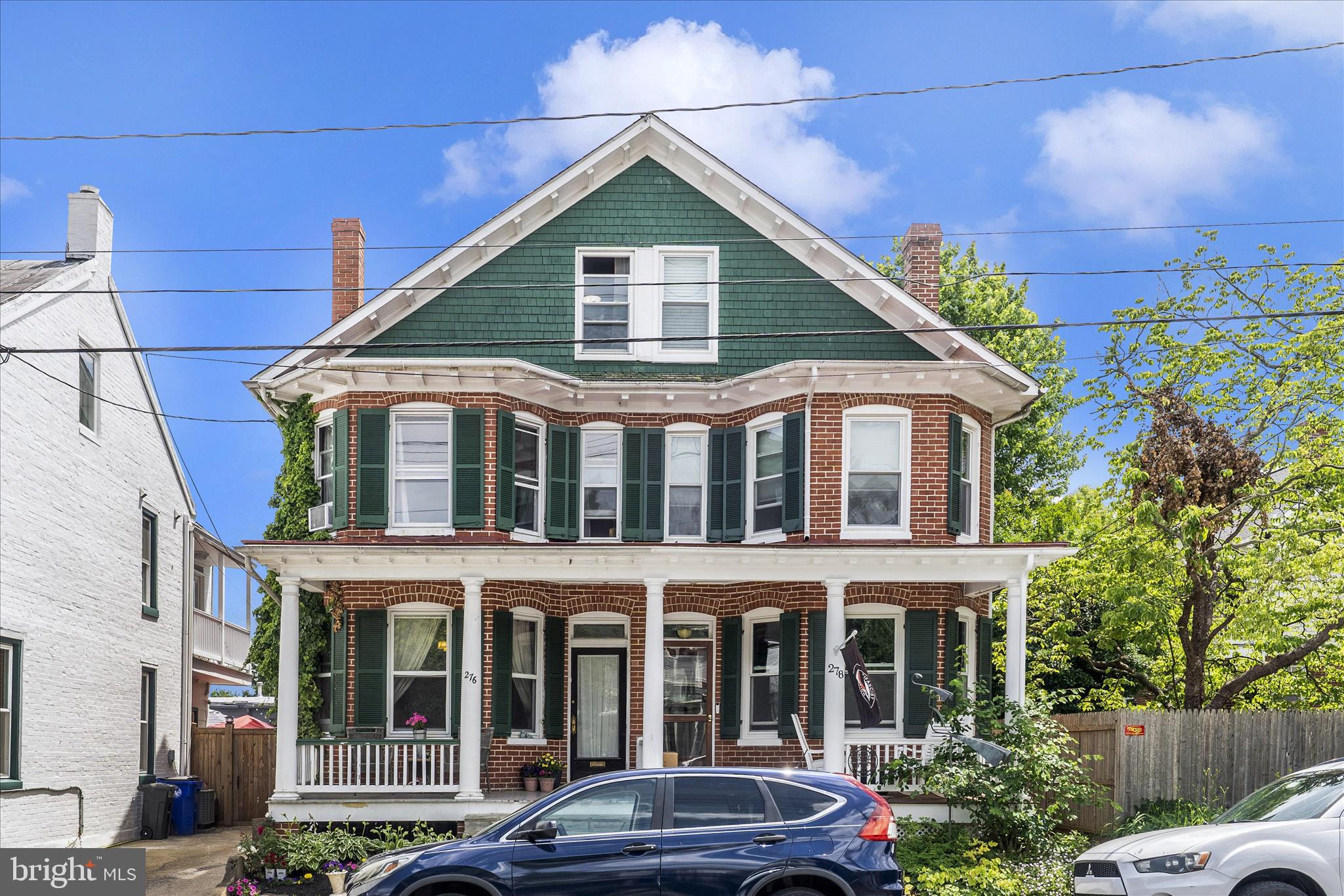 Historic 1910 Victorian Near Hood College – 6 Bedrooms, Timeless Character & Endless Potential:
Step back in time and discover the charm, craftsmanship, and grand proportions of this remarkable 1910 home, ideally located just steps from Hood College. Rich in architectural detail and brimming with potential, this spacious residence offers six bedrooms, one full bath, and an abundance of original character rarely found today.
A welcoming front porch sets the tone, while upper and lower-level rear porches provide additional outdoor living spaces perfect for relaxing and enjoying the neighborhood atmosphere. Inside, you'll be greeted by a beautiful tiled vestibule, graceful curved plaster walls, intricate wood trim, and an ornate fireplace that serves as a stunning focal point. Large bay windows on both the front and sides of the home flood the interior with natural light and highlight the home's historic charm.
The main level offers a front parlor, dining room and oversized kitchen and half bath.  On the second level of the home is three generous sized bedrooms and one full bath.  On the third level of the home are three more bedrooms.  Two under the eaves charmers and one oversized room that could be a fabulous home office, guest room, den, or bedroom.  The basement is concrete and makes for excellent storage.  The laundry is also located in the basement.
The generous room sizes throughout create a sense of grandeur and flexibility, offering ample space for family living, entertaining, home offices, or creative pursuits. While the property would benefit from updates and improvements, it remains completely serviceable and presents an exceptional opportunity to restore and personalize a true Frederick classic.
The low-maintenance rear yard allows you to spend less time on upkeep and more time enjoying the home's unique features and prime location. Ample on-street parking adds convenience for residents and guests alike.
Whether you're an investor, preservation enthusiast, or buyer seeking a distinctive historic property with room to grow, this rare offering combines location, character, and potential in one unforgettable package.
***Seller is ideally seeking a short or long term rent back.  Inquire with listing agent about details.***