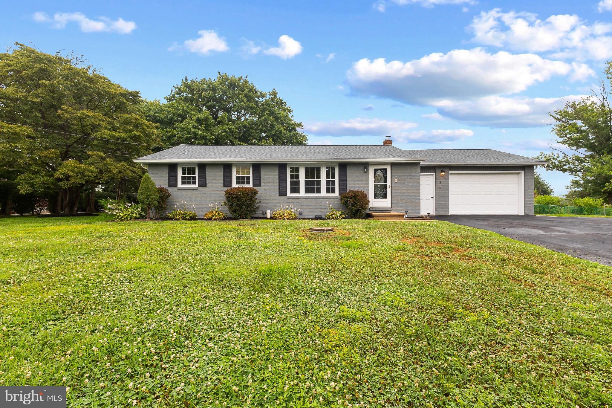Welcome home to this beautifully maintained brick ranch, ideally situated on over half an acre in the award-winning Avon Grove School District. From the moment you walk in, you'll notice the pride of ownership throughout from the gleaming hardwood floors to the thoughtfully updated spaces designed for everyday living.

The heart of the home is the stunning kitchen, featuring brand new appliances, sleek quartz countertops, and updated flooring perfect for everything from quick weekday breakfasts to hosting family and friends. The open living and dining room layout is bathed in natural light and flows effortlessly for entertaining.

Downstairs, the partially finished lower level offers incredible flexibility with a spacious family room highlighted by recessed LED lighting, updated LVP floor, a convenient powder room, and a large unfinished storage area in the full basement ready for your finishing touches or extra storage needs.

Outside, enjoy the privacy and space of your over half-acre lot, plus an oversized 480 sq ft heated garage with front and rear access doors a rare find for hobbyists, extra vehicles, or a workshop setup.

This move-in ready home also boasts major peace-of-mind updates including newer, roof, septic, plumbing, and 200 amp electrical service, so all you have to do is unpack and enjoy.

With easy access to Routes 322, 52, Route 1, and I-95, commuting and daily errands couldn't be more convenient.

Don't miss this rare opportunity in Avon Grove Schools schedule your private tour today!