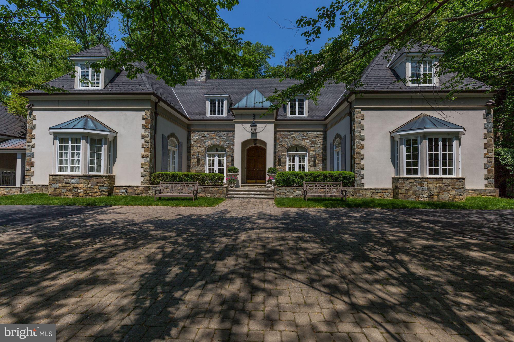 Welcome to 11218 River View Drive, in prestigious Marwood.  Hands down, one of the most beautifully built custom homes to ever come to market.  Custom built in the French style by a famous Hollywood producer with embassy sized public rooms, 14- foot ceilings, custom wrought iron railings, hand-designed crown moldings and absolutely exquisite craftsmanship, it’s one-of-a-kind.  While the light-filled spaces are grand, the design is timeless and tasteful and the home owner has multiple options for grand scale entertaining and comfortable family living.  One of the most unique features is an indoor/outdoor loggia with flagstone flooring and 3 motorized doors opening to a large patio and pool deck, with 60’ pool.  Above the loggia is a magnificent second story stone terrace overlooking the grounds, perfect for special evenings.  One must see this very special property in person to truly appreciate its beauty and value.  Located just 2-3 minutes past the Village and close to so many amenities.  You have to see this very special home in person to appreciate the incredible architecture and high-end finishes.