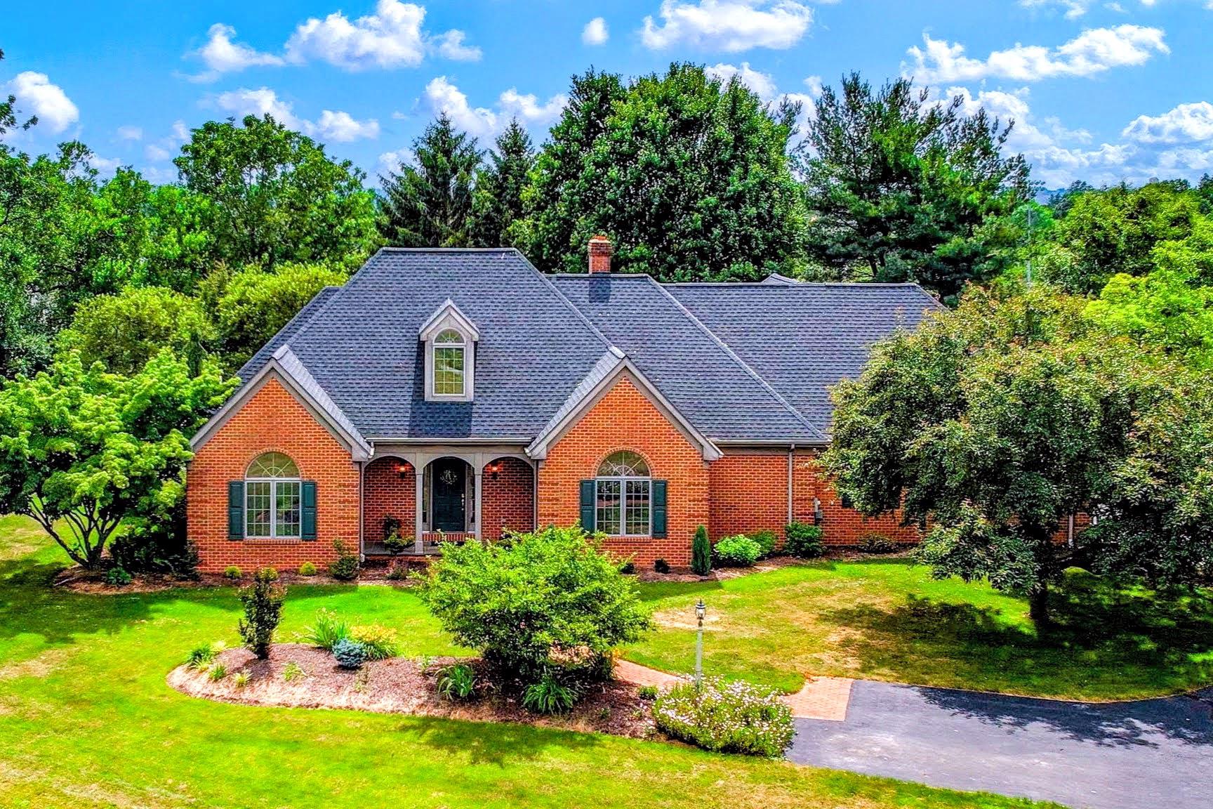 Stunning all-brick ranch home on a picturesque one-acre lot in Ephrata! A dramatic two-story foyer with an arched transom window welcomes you into the cathedral-ceiling great room featuring a cozy wood-burning fireplace and custom built-in bookshelves. The elegant dining room showcases a tray ceiling, wainscoting, an arched window, and fresh paint. The well-appointed kitchen offers granite countertops, hardwood floors, a breakfast bar, and a bright dining area overlooking the patio and backyard. The spacious primary suite features private patio access, a large walk-in closet, and a luxurious bath framed by corner windows, walk-in shower, double granite vanity, and linen closet. On the opposite side of the home, you'll find two additional bedrooms, a full bath, and a beautiful sunroom with a wall of windows, tile flooring, and access to the patio. Additional highlights include a convenient first-floor laundry with a washer and dryer, a utility sink, and a coat closet. Access to an attached two-car garage with steps to additional storage space and storage area for the central vacuum. The partial unfinished basement offers endless possibilities and includes a flue for a future stove, a water softener, and efficient geothermal heating. A rare opportunity to enjoy spacious one-floor living with quality finishes, abundant natural light, and a peaceful setting.