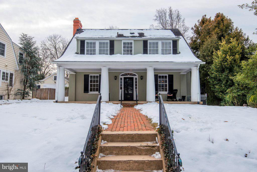 Stunning expansion/renovation of this utterly charming home on desirable block.  Welcoming front porch, formal entertaining spaces, ultimate gourmet kitch opens to breakfast rm and family rm, first floor den.Master Suite w/ French doors to private deck, walk-in closet, luxury bath, 3 additional bedrooms, upstairs den & laundry, 2 full hall baths.  Lower lvl features 5th BR, Fam Rm & rec rm.