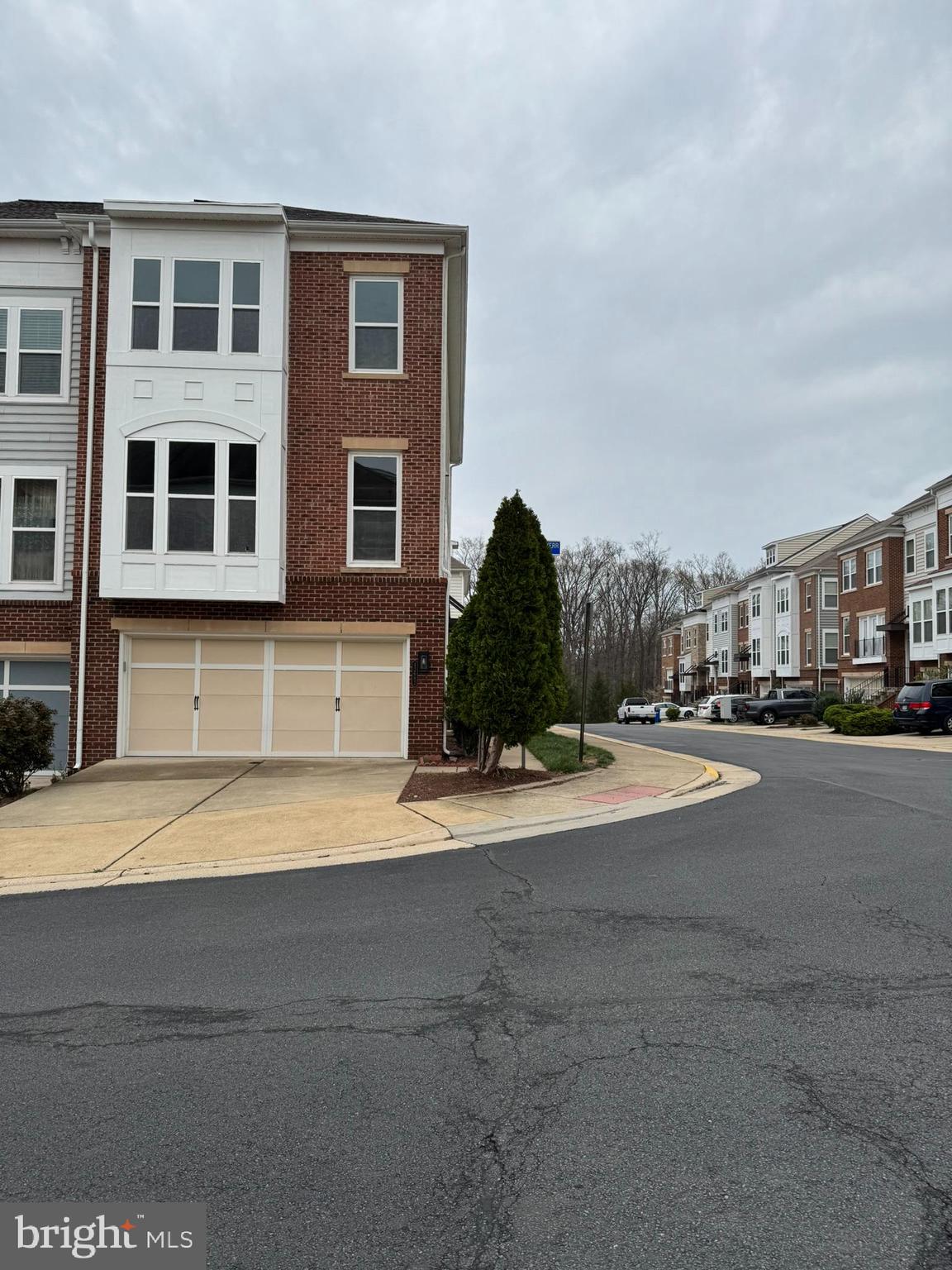 Don't miss this move-in ready 2 Car Garage Brambleton End Unit Townhome with open floor plan flooded with natural light  3-Bedrooms, 2-full and 2-half baths. New hardwood floor and carpet through out the house (2025), freshly painted (2025), New Roof with warranty (2025), upgraded bathrooms (2025), washer/dryer (2022), Highcrest Model w/ 3-Level Extension, 2480 Square Feet. Loaded w/ Builder Upgrades   Gourmet Kitchen w/ Granite Counters, island w/ Pendant Lights, Hardwood Floors, Stairs w/ Hardwoods and Carpet Runner, Wrought Iron Balusters, Luxury Master Bath w/ Walk-In Shower and Soaking Tub with Jets. Walk-Out Lower Level. Owner RE Licensee.