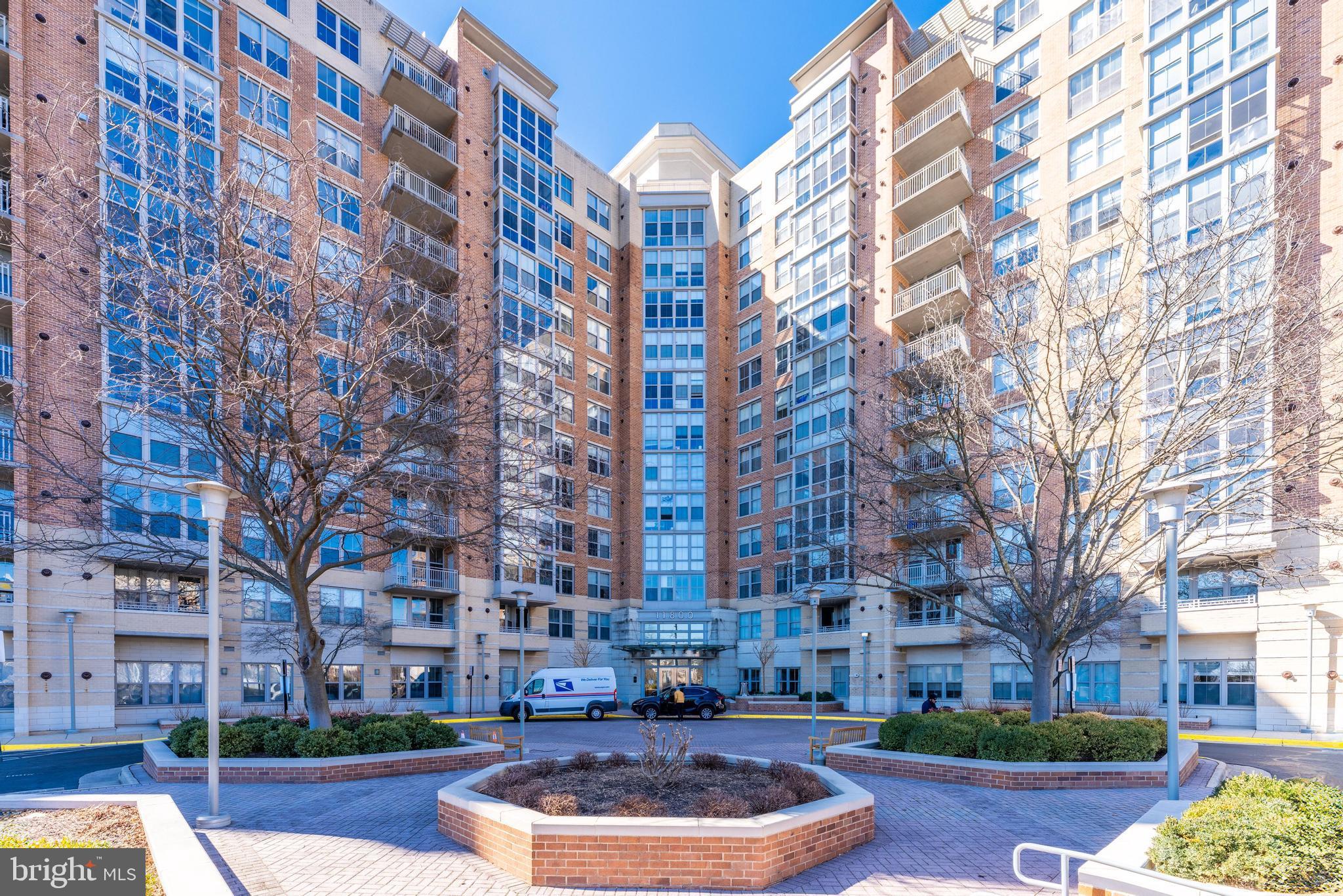 Welcome to 11800 Sunset Hills Rd, Unit 1210—a beautiful top floor 1 bedroom, 1 bath condo just a short walk from Reston Town Center’s shopping, dining, and entertainment, plus minutes from major commuter routes and the RTC Metro stop!

This light-filled unit features upgrades throughout, including granite countertops, stainless steel appliances, and hardwood flooring. The open-concept kitchen and living area provide the perfect space for entertaining, while the bedroom boasts an en-suite bath and a spacious walk-in closet. Step onto the private balcony to enjoy the stunning views from the top floor along with your morning coffee and a book.

Convenience abounds with in-unit laundry and an assigned garage parking space on the first floor of the parking garage. Carlton House offers fantastic amenities, including a game room, fitness center, outdoor pool, sauna, and more. Don’t miss this incredible opportunity—welcome home!