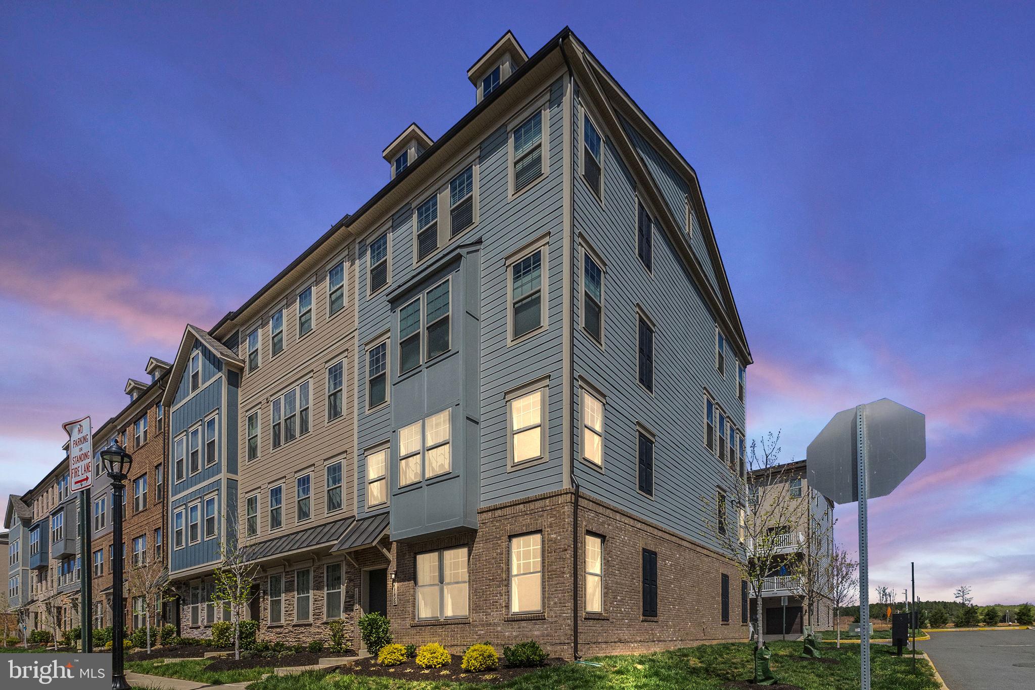 Welcome to 1138 Madeira Terrace, SE, a stunning light filled END-UNIT condominium in the heart of Leesburg, VA. Built by Stanley Martin Homes in 2020, this Savannah model offers two stories of beautifully designed living space with ground-level entrance that includes 2 Bedrooms, 2.5 Bathrooms  and 1,576 square feet of light-filled elegance.

Thoughtful upgrades and modern finishes enhance the home’s appeal, creating a perfect blend of style and functionality. The open-concept layout showcases 9’ ceilings, elegant hardwood flooring, recessed lighting, and an upgraded stairwell railing that enhances the home's airy feel. The spacious kitchen features an abundance of cabinetry, pull-out drawers, quartz countertops, a pantry, and appliances that include refrigerator, microwave, flat glass top electric range, dishwasher, and garbage disposal. The main level also includes a convenient half bath and easy access to your private one-car garage, along with a second parking space on the paved driveway.

Upstairs, the luxurious primary suite offers a peaceful retreat with two large walk-in closets and a spa-like ensuite bath featuring a tiled shower with a seamless glass enclosure. Designed for flexibility, this home includes one to two additional bedrooms, a second full bath, and the convenience of a front-loading Electrolux washer and dryer on the upper level. You are sure to enjoy the elongated balcony on this level, an ideal space for morning coffee or evening relaxation. High-speed internet options are available to ensure seamless connectivity for work and entertainment.

Starting in May 2025, residents will have access to an impressive new clubhouse, a swimming pool, tot lots, pickleball courts, and a paved trail leading directly to the W&OD Trail, which connects Purcellville to Washington, D.C. With major roadways nearby, the Silver Line Metro just 9.3 miles away, Dulles International Airport only 13 miles from home, and the Leesburg Park & Ride with Bus service only 2.7 miles away makes commuting effortless. Plus, the home’s prime location offers convenient access to shopping, dining, and entertainment, making it the perfect place to live.

Don't miss this exceptional opportunity!