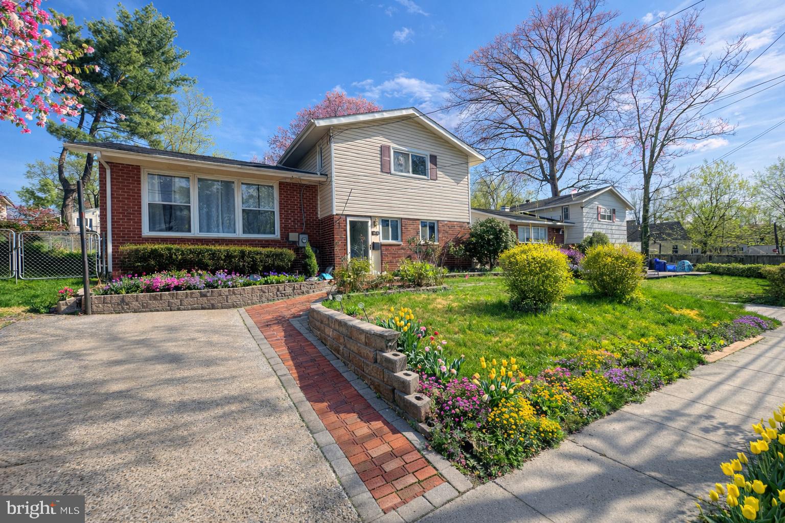 Welcome to this well-maintained split foyer home offering  four levels of living space, functionality, and endless potential in a desirable Silver Spring location. Set on a generously sized lot with a large backyard, this property provides the perfect blend of indoor comfort and outdoor living. The main level features a bright and updated kitchen with granite countertops, stainless steel appliances, and abundant cabinetry, flowing seamlessly to a spacious dining area—ideal for everyday living and entertaining. The living spaces are filled with natural light and offer a versatile layout to suit a variety of needs. Upstairs, you’ll find comfortable bedrooms with hardwood flooring and ample closet space. The lower level provides additional living space perfect for a family room, home office, or guest area, along with a dedicated laundry area and utility space. Enjoy outdoor living with a private rear patio and expansive yard—perfect for gatherings, gardening, or future expansion. The driveway offers convenient off-street parking, and the home’s classic brick and siding exterior adds to its curb appeal. Conveniently located near shopping, dining, commuter routes, and local parks, this home offers both accessibility and value. A fantastic opportunity for homeowners and investors alike—move in as-is or add your personal touches to make it your own.
*There was an addition added making this property closer to 3,000 square feet.  Thus, the square footage in public records is incorrect.
