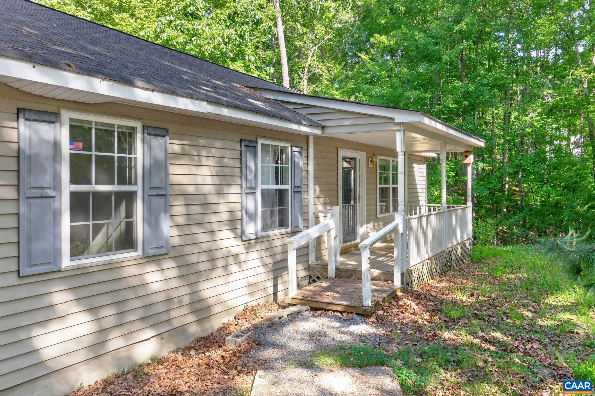 Opportunity awaits at Lake Monticello with this 3-bedroom, 2-bath ranch offering solid potential and a functional layout ready for your vision. Enjoy seasonal cove views and the convenience of one-level living, plus peace of mind with a newer heat pump and hot water heater already in place.  The full unfinished basement offers abundant storage or future expansion possibilities with roughed-in plumbing for an additional bath. This home needs TLC and is being sold as-is, making it an excellent opportunity for investors, renovators, or buyers looking to build equity.  Located in the amenity-filled Lake Monticello community with access to lake activities, golf, beaches, parks, and more ? bring your ideas and transform this property into something special!,Formica Counter,Fireplace in Living Room