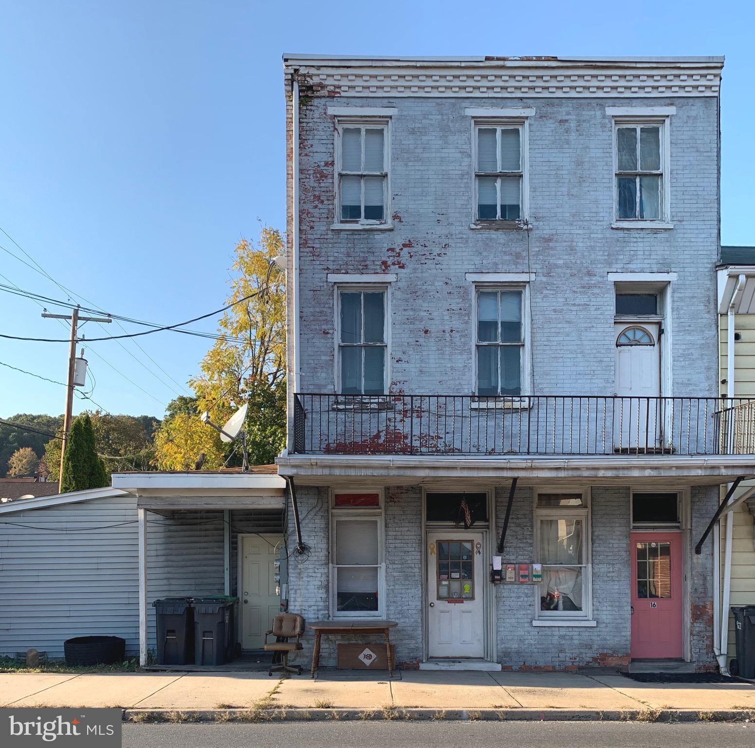 Great Investment opportunity with this 4 unit income producing property! Tenants pay electric heat and there is coin operated laundry in basement.