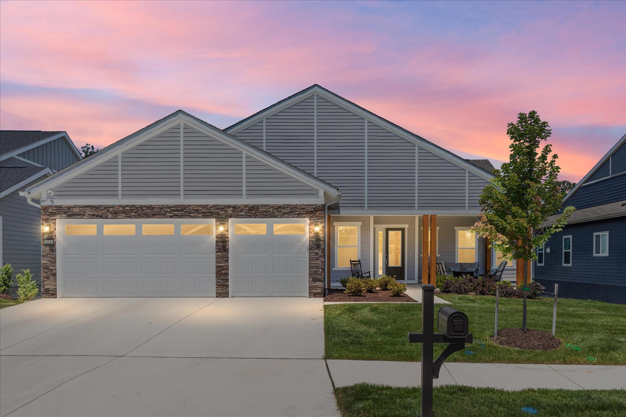 Why wait to build when you can move into a home that feels brand new?

Welcome to 124 Nandina Place, an exceptional 2024 Hensley II in Trilogy at Lake Frederick, the Shenandoah Valley's premier 55+ resort community. Completed in August 2024 and thoughtfully designer enhanced with more than $300,000 in post-build upgrades, this stunning Shea home offers a rare opportunity to enjoy new construction without the wait, decisions, or expense of starting from scratch.

The difference is apparent from the moment you walk through the door. Beautiful luxury plank flooring flows throughout the open main level, anchored by a gourmet kitchen designed for both everyday living and entertaining. Featuring Brittanicca Suede quartz countertops, a custom apron-front sink, KitchenAid double ovens, a 36-inch gas cooktop, and a generous walk-in pantry, the kitchen opens seamlessly to the Great Room and beyond.

A dramatic 15-foot multi-slide door connects the interior living space to an extended screened in deck, each featuring its own gas fireplace, creating effortless indoor-outdoor living throughout the seasons. The screened deck provides the perfect place to enjoy a quiet morning coffee or unwind at the end of the day.

The main-level primary suite offers a peaceful retreat with an oversized closet with custom built-in drawers and shelving and a spa-inspired bath featuring a frameless glass shower and soaking tub. The walk-out lower level was designed for entertaining, complete with a third bedroom, full bath, custom built-ins, designer wall treatments, wet bar, dedicated home theater with projector, remote red velvet curtain, and Palliser recliners. 

Every detail has already been completed: Control4 smart-home automation, Sonos audio throughout, full surveillance system, smart locks, whole-house water filtration, irrigation, premium garage door, and tankless water heater.

Perhaps most remarkable is how little the home has actually been lived in. This home was purchased, designed and built-out for over a year before the seller ever moved in and he hardly spent time there. Many of the home's premium features, appliances, theater equipment, and recreational spaces have been used only a handful of times, giving the property the feel of a professionally designed model home rather than a resale.

This unique house is located in a truly unique community. Step outside and enjoy everything Trilogy at Lake Frederick has to offer, including Shenandoah Lodge, lakefront pools, fitness facilities, dining, pickleball courts, and miles of scenic trails. This is a rare opportunity to own a meticulously upgraded, nearly new home where every improvement has already been made and every detail is ready to enjoy.