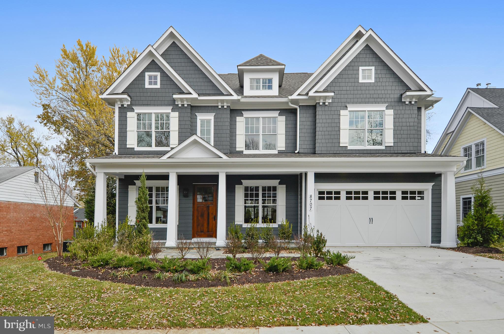 Fully Finished! Spacious Arts & Crafts Colonial masterpiece, built by award-winning builder Mid-Atlantic, offers 5BR, 4.5BA, chef's kitchen, 1st flr library & mud rm, 2-car garage, screened-in porch, owner's suite w/his&hers WICs and spa BA, 2nd flr hw/study area, finished lwr lvl incl 5th BR, FB, dry bar, rec rm, media rm, exercise rm and walk-up side exit. Part of the Whitman HS Cluster.