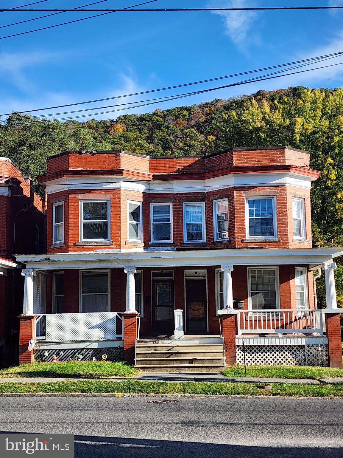 Welcome to this charming 3-bedroom, 1.5-bath attached townhome located in the heart of Keyser, West Virginia. Step inside and you’ll find spacious rooms filled with natural light, offering a comfortable and inviting atmosphere throughout. The large living area provides plenty of space for family gatherings.
Enjoy relaxing mornings or quiet evenings on the nice front porch, or unwind on one of the two rear porches overlooking the private backyard. The rear porches do need some TLC.  The full unfinished basement offers ample storage space or the potential to create your own workshop or recreation area.
Conveniently located close to shopping, dining, schools, and other local amenities, this home combines comfort with convenience. The seller is MOTIVATED and ready to entertain all offers, so don’t miss your chance to make this lovely property your new home. Schedule your showing today!