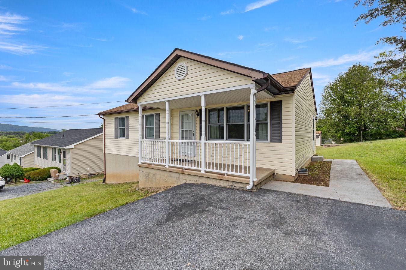 Well-kept rancher with full basement situated on a nice in-town lot with beautiful mountain views! This home offers 2 bedrooms on the main level with a possible 3rd bedroom in the basement, along with 1.5 baths. Covered front porch faces Signal Knob and is the perfect spot to relax and enjoy the scenery. A full  partially finished basement could provide additional living space, storage, or hobby area possibilities. Newer roof already in place and the home has been well maintained over the years. Convenient in-town location with a nice yard and plenty of potential! Sager Associates makes no representation as to the accuracy or reliability of the information. Buyers should exercise their own due diligence in the investigation of matters related to the property that are material to a buyers decision to purchase any property listed for sale by Sager Associates.