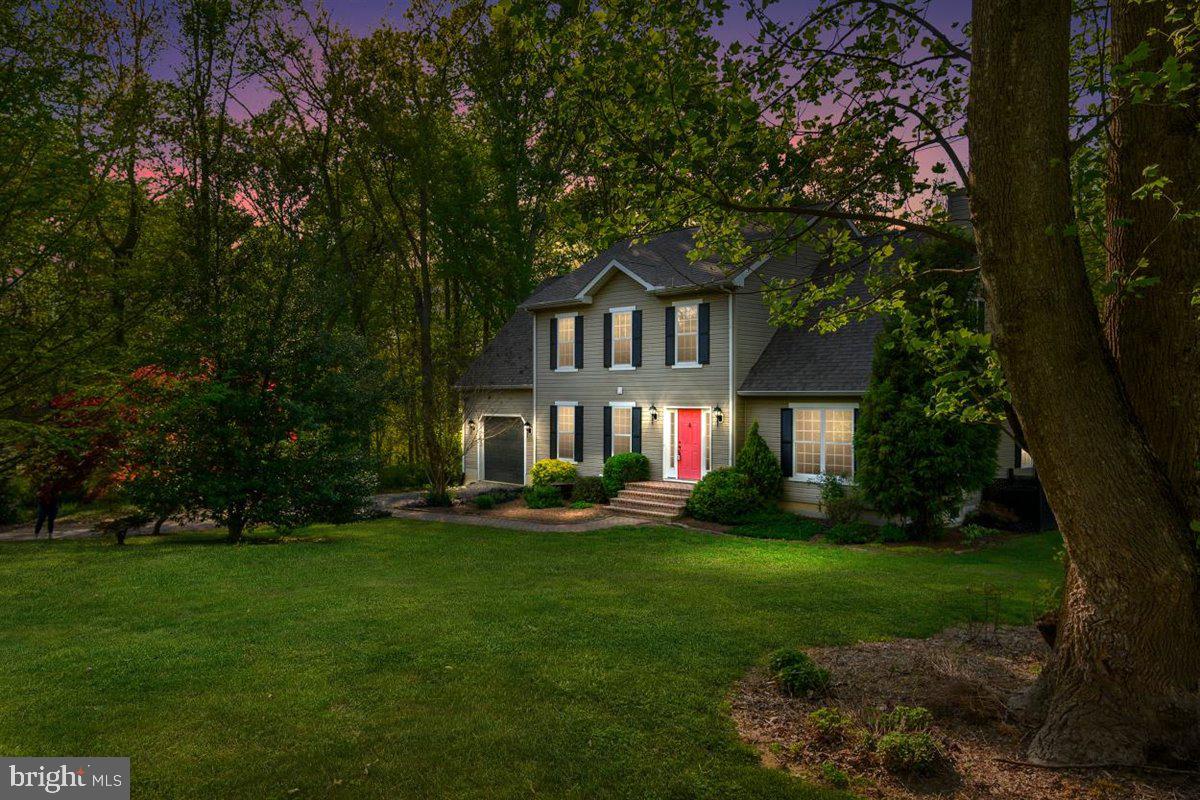 Welcome to 25238 Swamp Road on a beautiful, wooded private 1 acre lot. This home boasts OVER 2600 sq ft of total living space. When you walk into this home, you are greeted with an open floor plan, large bedrooms with plenty of storage and unfinished basement. To the right you have a large, open living room with a custom mantle and space for a woodstove. To the left you have the coat closet and half bathroom. Entering in the kitchen and dining room, this home offers an open concept with kitchen and dining room that opens to the living room. The kitchen offers a large custom, kitchen island that matches the mantel in the living room, ample cabinet space and counter space, stainless steel appliances, and granite counter tops. Off the kitchen, boosts an oversized laundry and mudroom with additional storage. Moving upstairs you have a bright home office with hardwood floors. Off the hallway to the left, is the full bathroom with shower/tub combo. On the right are 2 large secondary bedrooms with large closet space and new carpet. The massive owner's suite has brand new carpet and his and her closets. The owner's bathroom offers a standup shower, upstairs laundry hookup, and plenty of storage space. Moving downstairs to the basement, you will find over 1,000 sq ft of unfinished space.  This home offers plenty of privacy on a 1-acre wooded lot with mature landscape.  Close to Betterton Beach, Worton and a few minutes outside of Chestertown! Come claim this HOME today!!