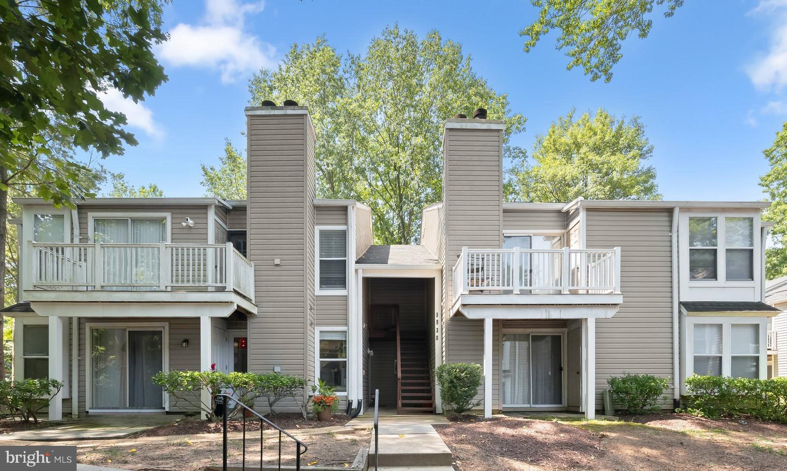 Welcome to this beautifully maintained condominium in the desirable Village of Hickory Ridge. This spacious 2-bedroom, 2-bath home offers an open, comfortable floor plan filled with natural light and designed for easy everyday living. The primary suite features its own private bath, while the second bedroom provides flexibility for guests, a home office, or additional living space. An in-unit washer and dryer add everyday convenience. Enjoy all that this established community has to offer, including beautifully maintained common grounds, scenic walking and jogging paths, an outdoor pool, playgrounds, and a community center. The condominium association also covers lawn care, trash removal, and water, providing a low-maintenance lifestyle.  Ideally located in the heart of Columbia, you'll be just minutes from shopping, dining, parks, commuter routes, and everything Hickory Ridge has to offer. This inviting home is one you won't want to miss.