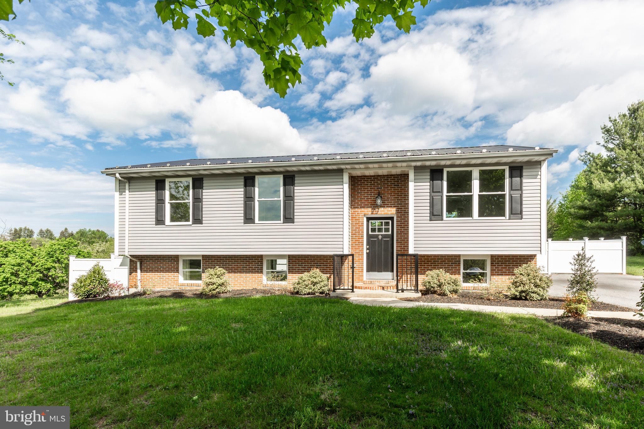 BEAUTIFULlY RENOVATED IN 2019!! ALL NEW KITCHEN W/ SOFT CLOSE SOLID WOOD CABINETS,QUARTZ COUNTERS AND SS APPLIANCES;NEW HARDWOOD  AND CARPET;NEW INTERIOR AND EXTERIOR DOORS; ALL BATHS COMPLETELY RENOVATED; ALL NEW ENERGY EFFICIENT WINDOWS;NEW HIGH EFFICIENCY HVAC AND WATER HEATER;NEW LIGHT FIXTURES AND RECESSED LIGHTING;SITS ON A GORGEOUS PRIVATE 1 ACRE LEVEL LOT WITH FENCED IN AREA! NEW SHED AND UPGRADED MAINTANENCE FREE DECK ASSITIONAL KITCHEN CABINETS ADDED. ALL APPLIANCES NEW WITHIN LAST 2 YEARS EXCEPT MICROWAVE. NEW FRONT PORCH AND NEWLY UPGRADED BATHROOMS! THIS ONE'S A 10!!