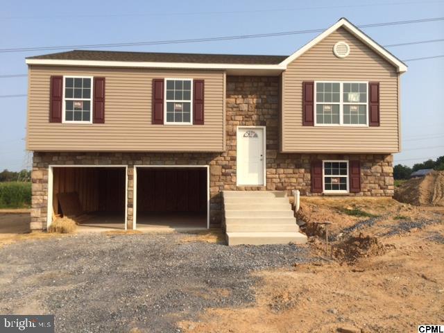 Bi-Level home in Towns Edge. Roughed-in plumbing in lower level. Cathedral ceiling in living rm,& kitchen area, Great open plan. Option sheet on line.
