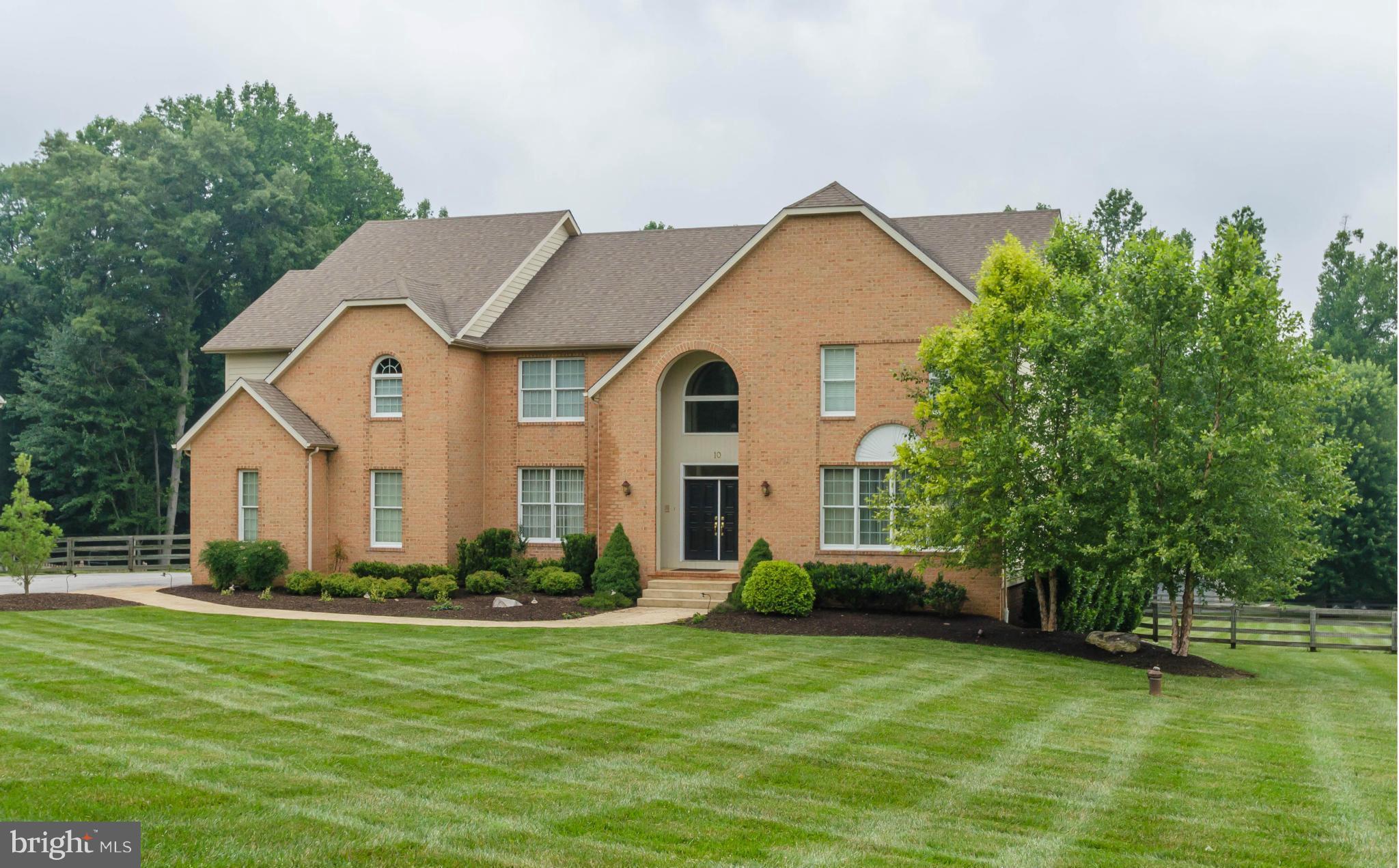 MAJOR PRICE REDUCTION! Many recent updates, in this light filled, open floor plan home including HVAC, kitchen.  Soaring ceilings, gleaming hardwoods, large main level library, oversize master suite with sitting area & luxury bath. Huge deck overlooking large level fenced yard. GREAT VALUE AND READY TO MOVE RIGHT IN!