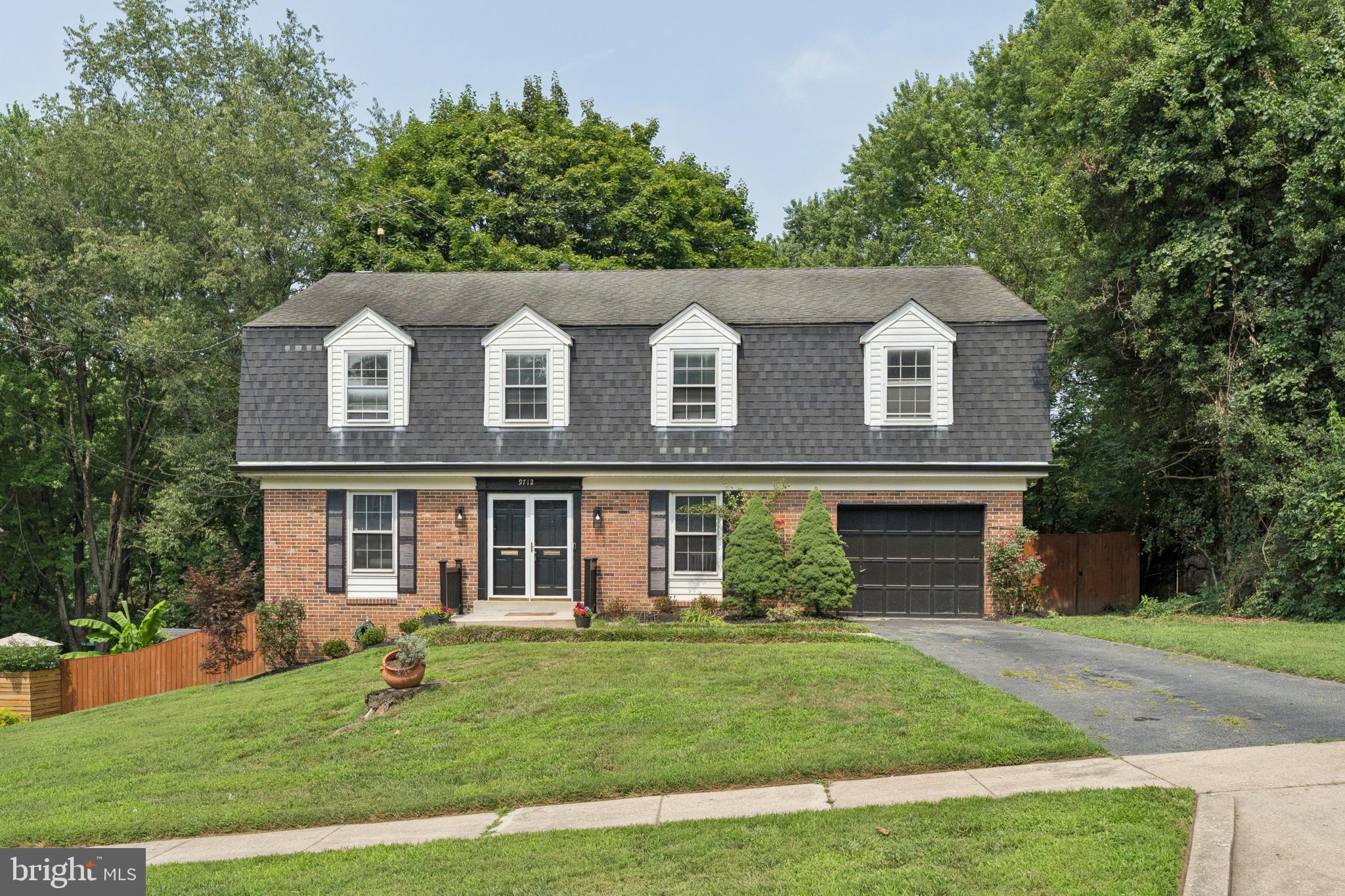 Nestled on a quiet street in sought-after Kensington, this beautifully upgraded 4-bedroom, 3.5-bath colonial offers the space, comfort, and flexibility that make a home feel instantly welcoming. Set on a generous fenced lot, the home features timeless curb appeal, fresh paint throughout, new fixtures, refinished hardwood floors, and inviting living spaces designed for everyday comfort.

The main level flows easily for everyday living and entertaining, including a comfortable family room with a full-wall fireplace. Upstairs, the spacious bedroom layout includes renovated bathrooms with a fresh, elevated feel, creating a peaceful place to unwind at the end of the day. The finished lower level with new carpet adds valuable flexibility for movie nights, a home office, exercise space, guest space, or casual gatherings.

Step outside to enjoy the oversized deck, outdoor entertaining space, and expansive fenced backyard with plenty of room to garden, relax, or host summer barbecues. With nearby parks and quick access to major commuter routes, 9712 Hill St blends peaceful neighborhood charm with everyday convenience in a prime Kensington location.