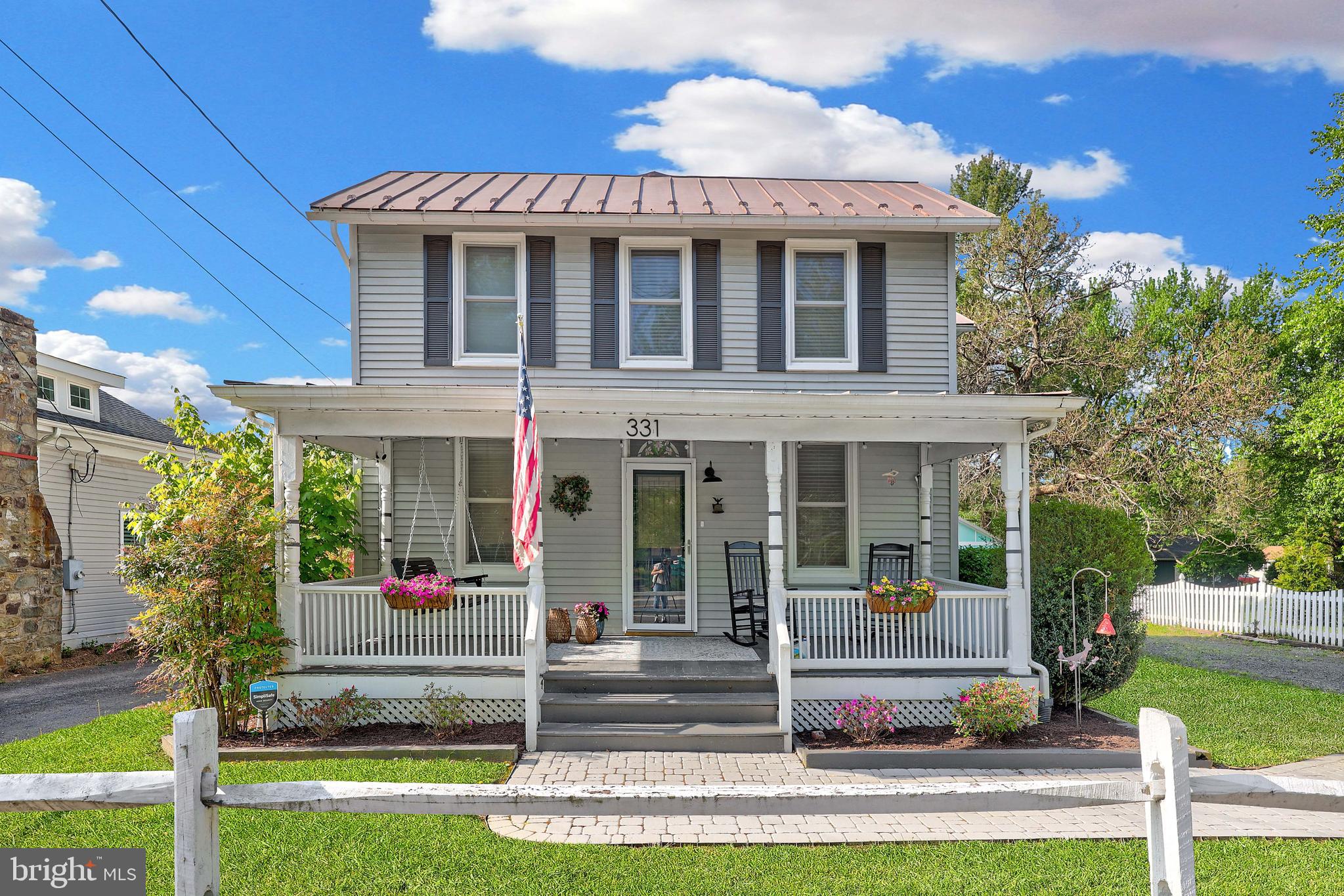 Charming 1890 Historic Home on Nearly ½ Acre Lot – Thoughtfully Updated Throughout
Step into timeless charm with this beautifully preserved and thoughtfully updated single-family home, originally built in 1890. Nestled on a generous and private nearly half-acre lot, this home blends historic character with modern conveniences.
Enjoy relaxing evenings on the wonderful covered front porch, complete with a swing, or host gatherings on the spacious flagstone patio and large rear deck that overlook mature trees and a flat, grassy backyard.
Inside, you’ll find original woodworking details, including custom paneling, crown molding, and tall baseboards, giving the home warmth and character. Natural light pours through all-new windows, and the new front door and frame make a welcoming first impression.
The kitchen has been stylishly updated with new countertops, added cabinetry, newer appliances, and a dishwasher. The dining room, hall bath, and laundry area have also been refreshed, while modern touches like recessed and updated lighting, along with new flooring throughout the main level, enhance everyday living.
Upstairs, you’ll find a rare primary suite for a home of this era, featuring a spacious bedroom, generous closet, and a brand-new En-suite bathroom with dual vanities, a luxurious walk-in shower, and a private water closet. Two additional bedrooms and a refreshed hall bath complete the upper level.

Don’t miss the detached work shed/art studio—perfect for hobbies, remote work, or creative projects.

This unique property offers the charm of historic craftsmanship with the comfort and style of modern updates, all in a tranquil, private setting.